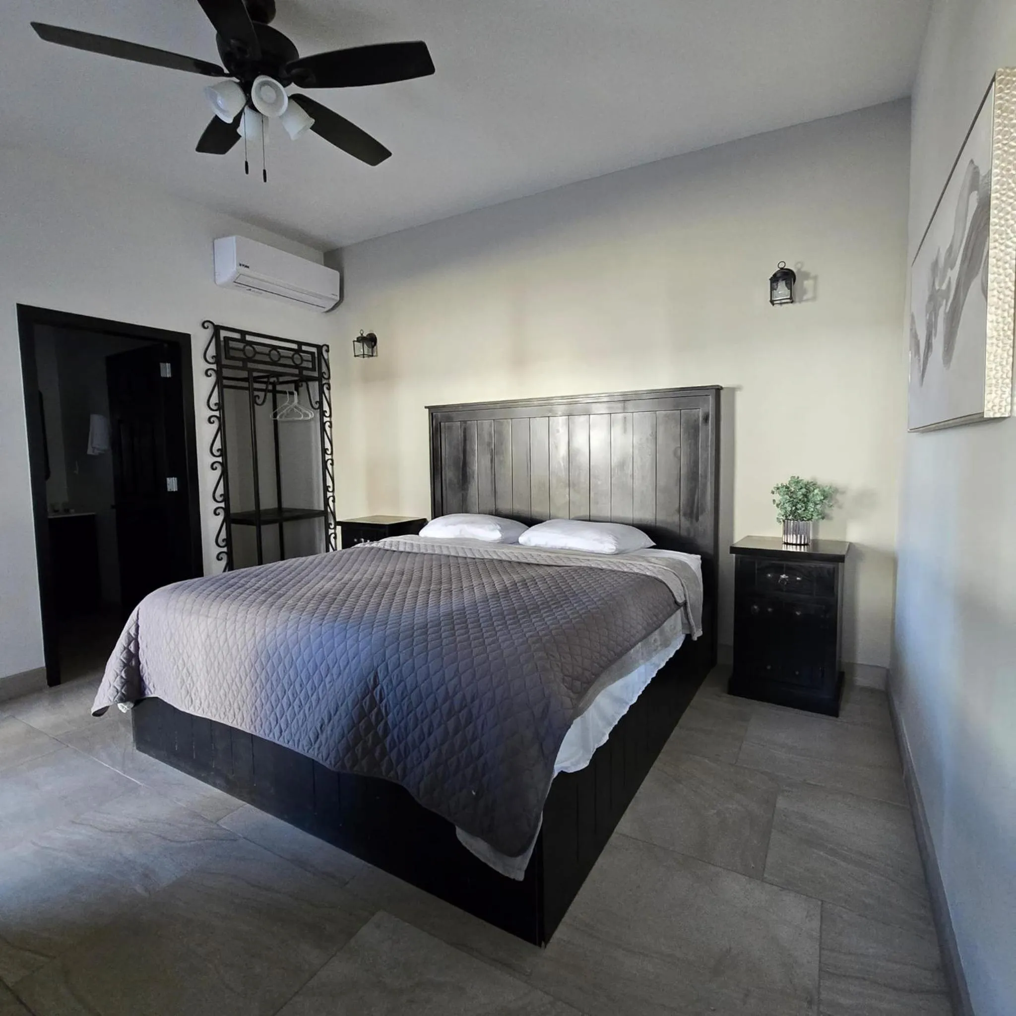 Bed in Playas Hotel Suites