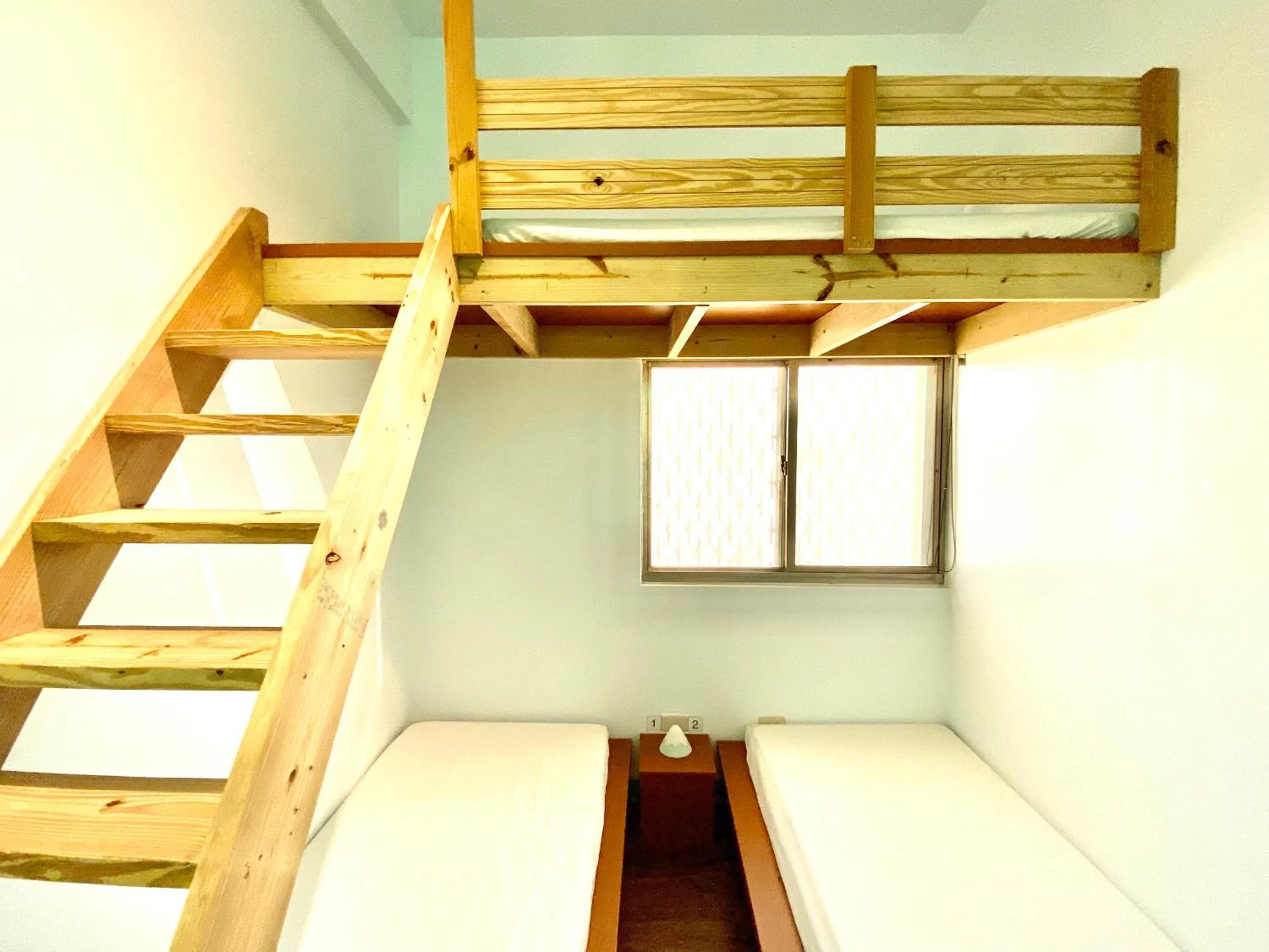 Photo of the whole room, Bed in 澎湖北吉光背包客民宿 Bayhouse Hostel Penghu