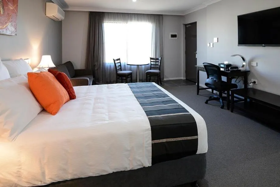 Bed in Astro Dish Motor Inn