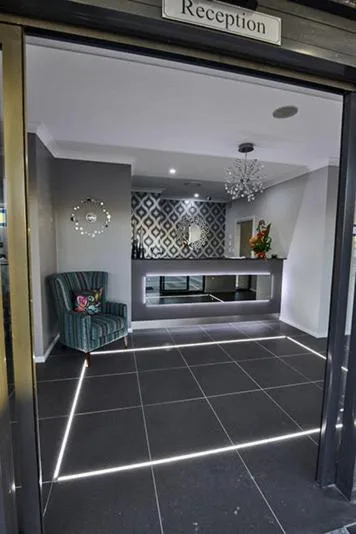 Lobby or reception in Astro Dish Motor Inn