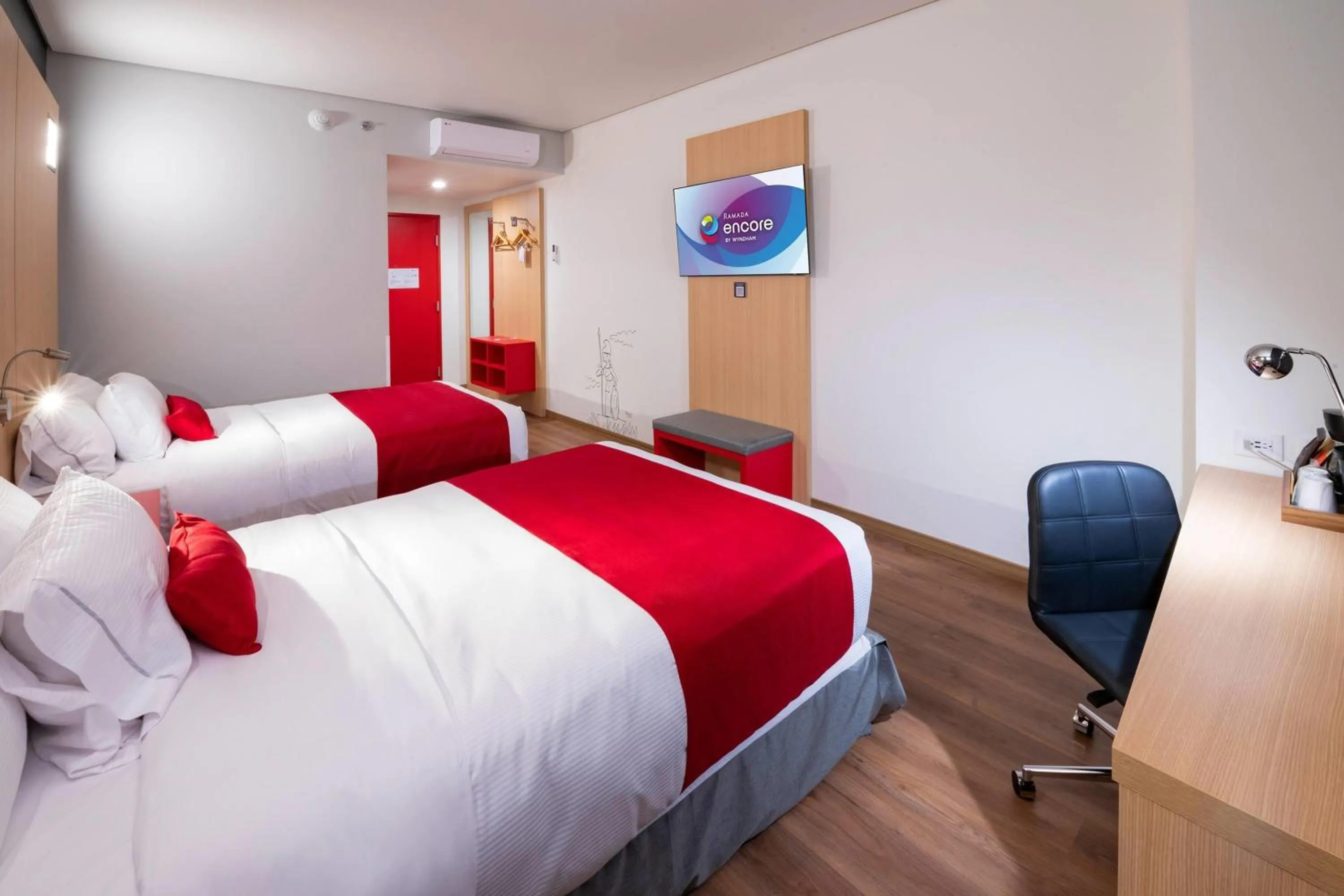 Photo of the whole room, Bed in Ramada Encore by Wyndham Guadalajara Aeropuerto