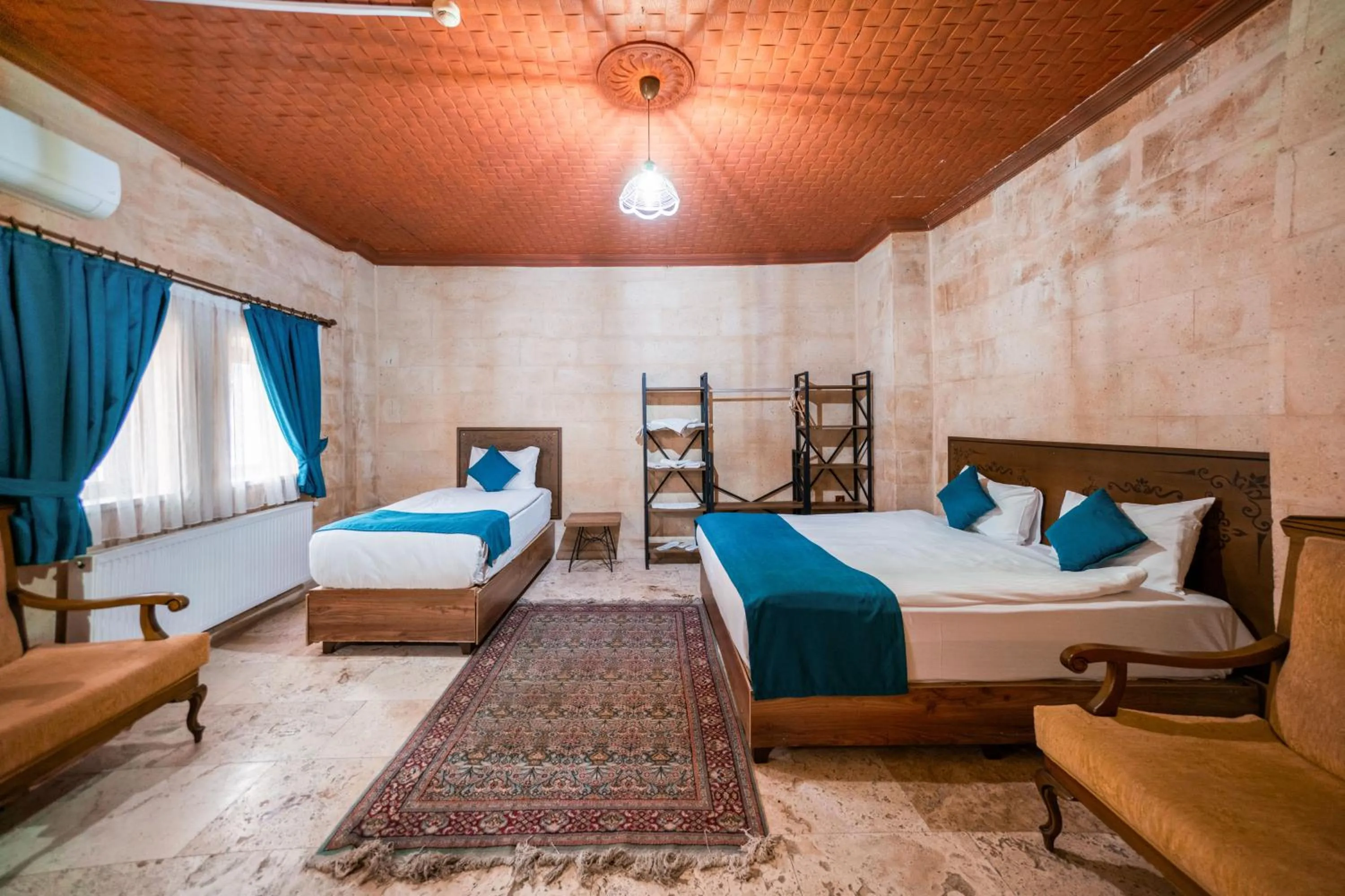 Bed in Azalea Terrace Cave Hotel