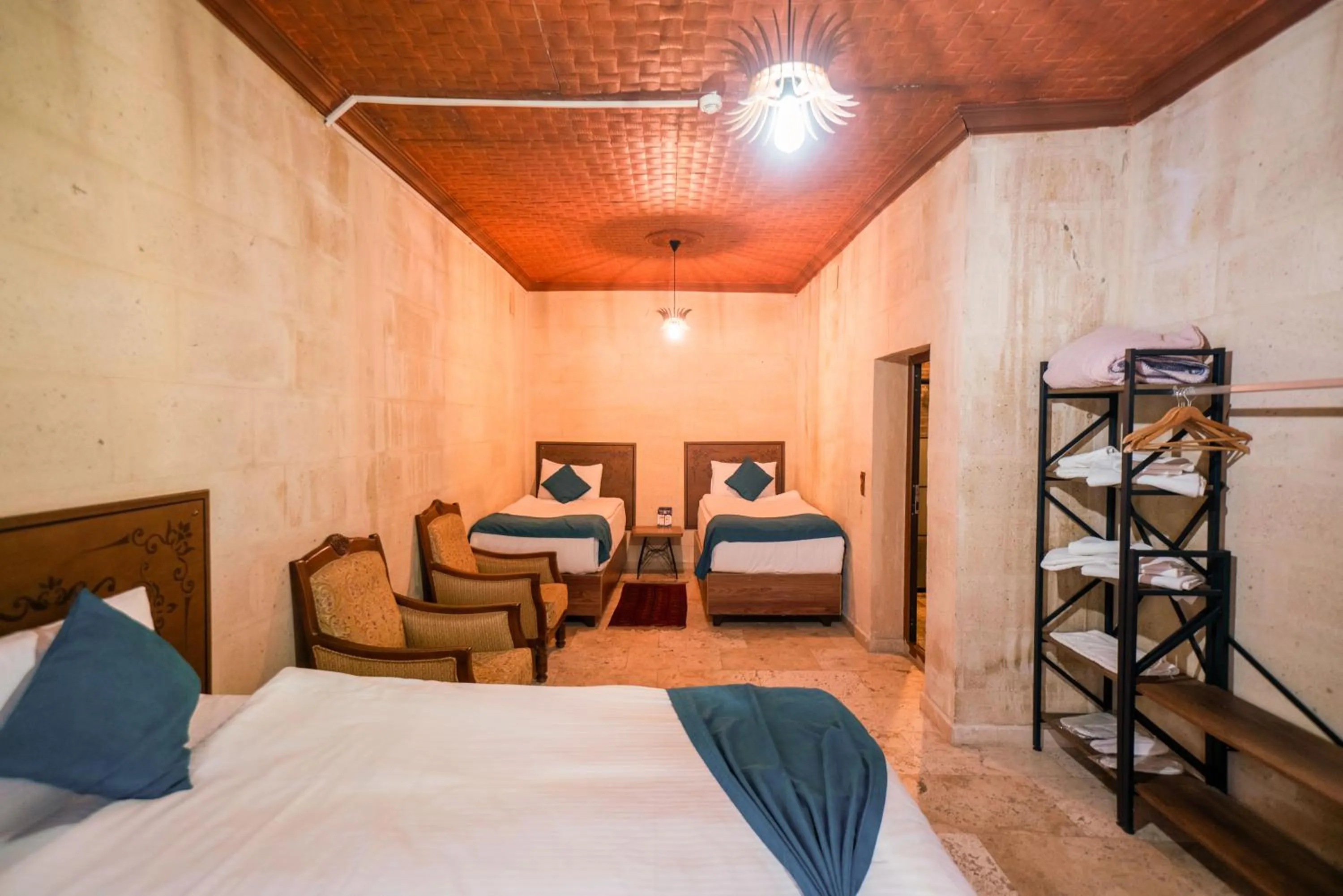 Bed in Azalea Terrace Cave Hotel