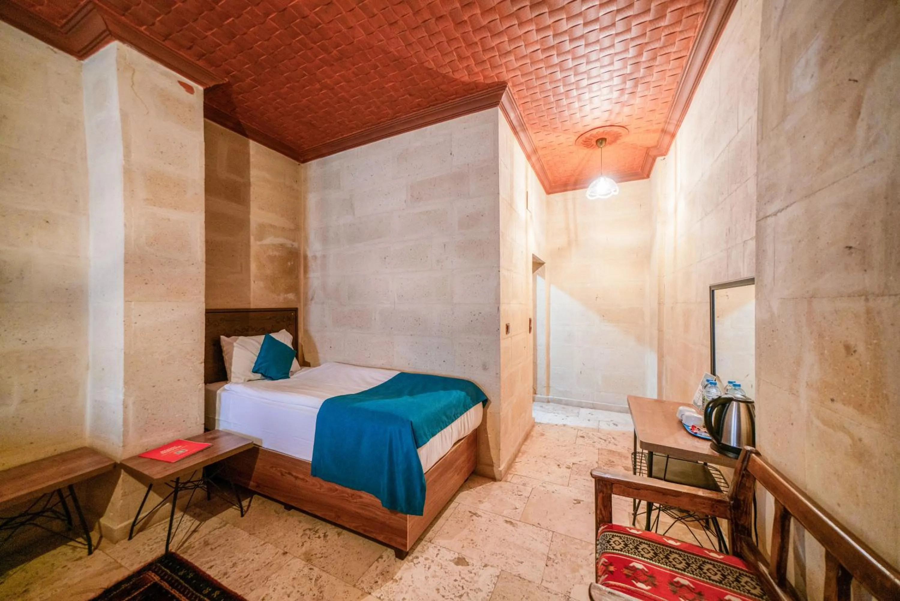 Bed in Azalea Terrace Cave Hotel