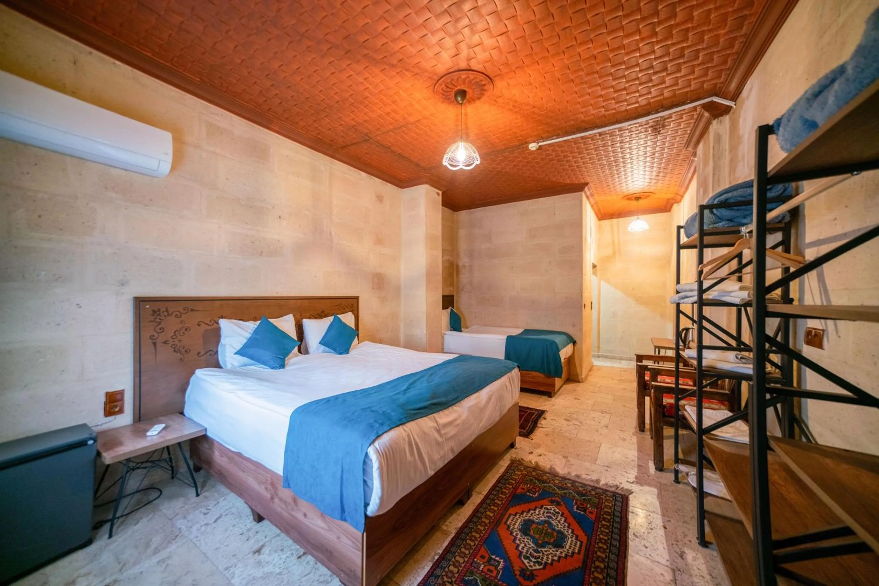 Bed in Azalea Terrace Cave Hotel