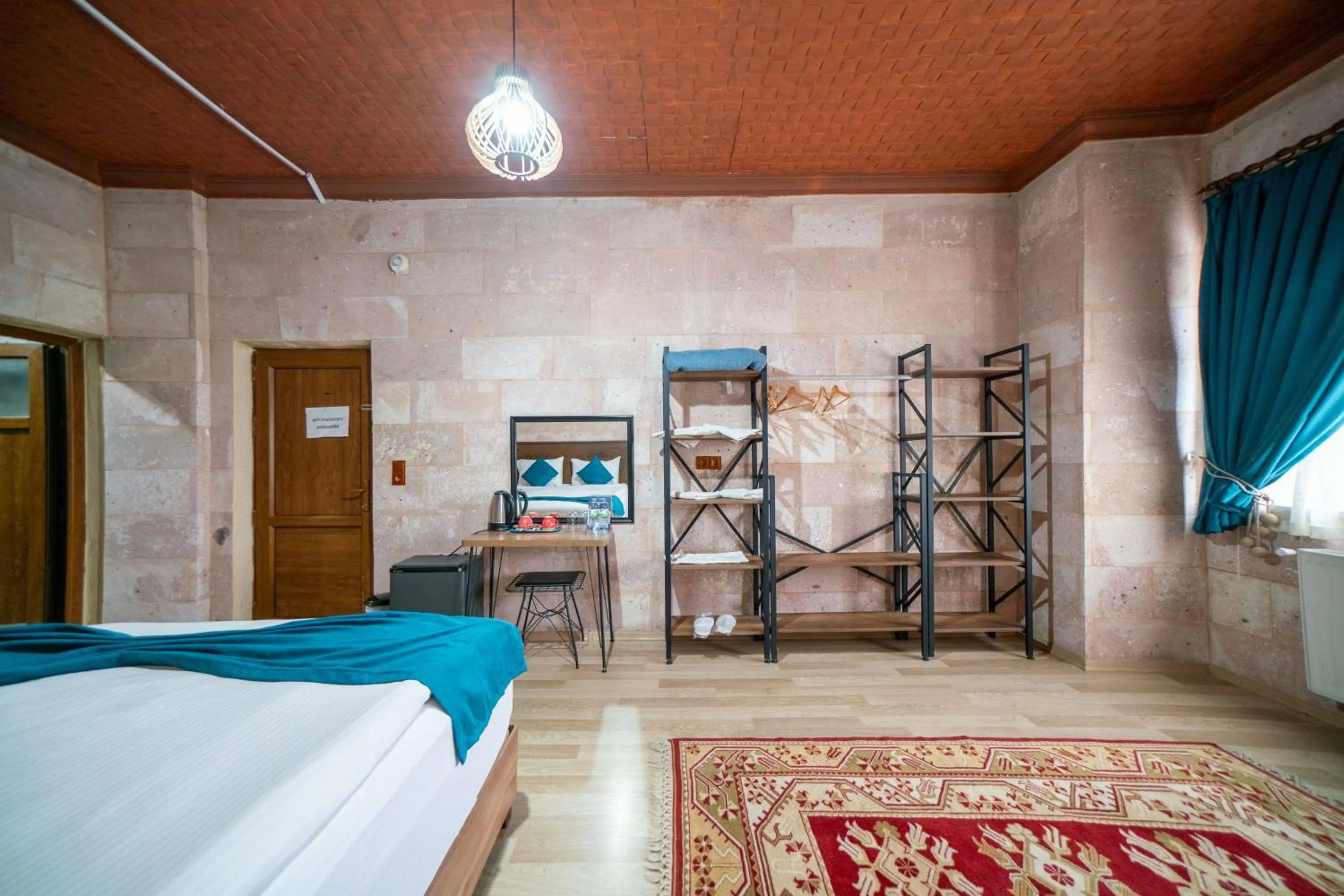 Bed in Azalea Terrace Cave Hotel