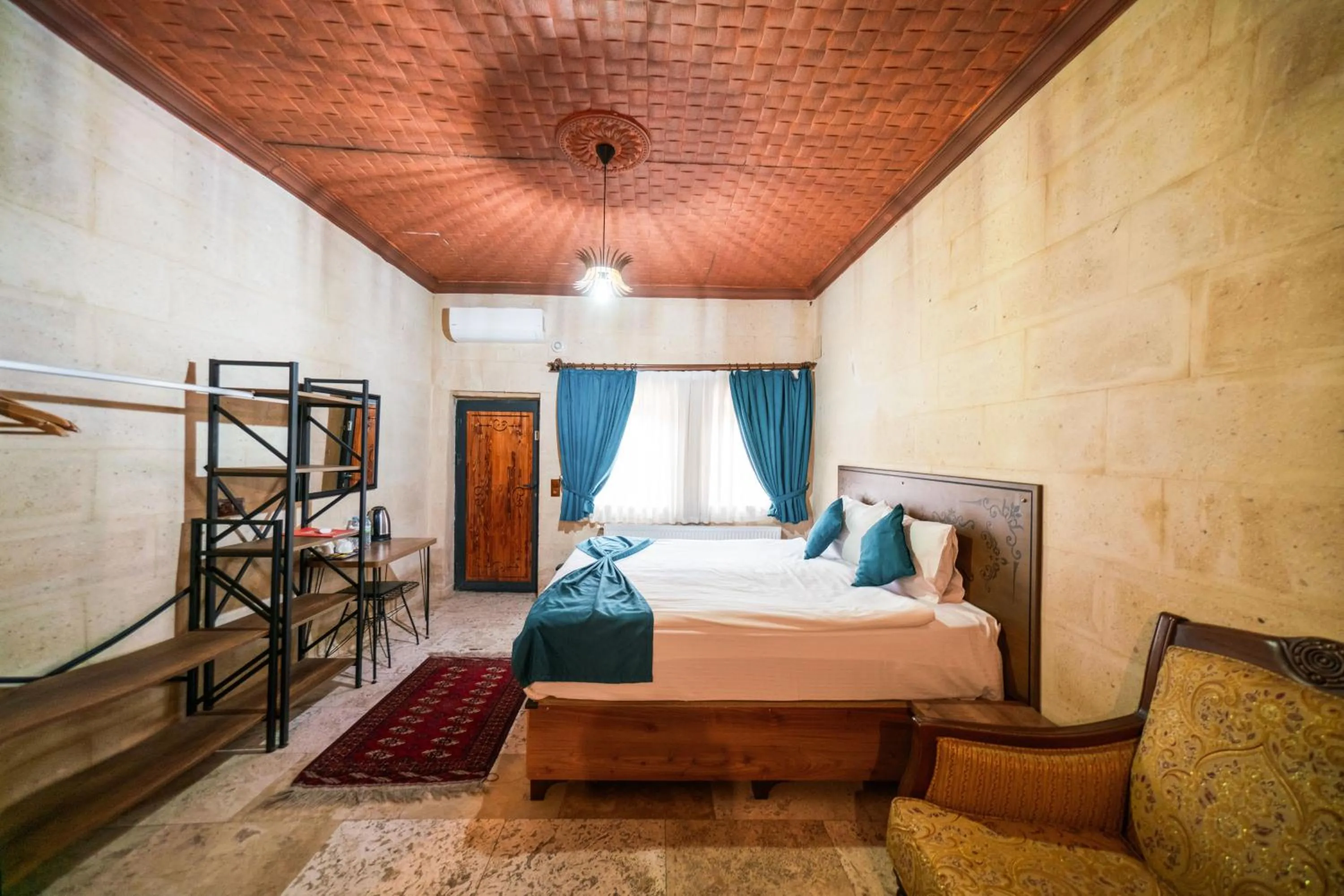 Bed in Azalea Terrace Cave Hotel