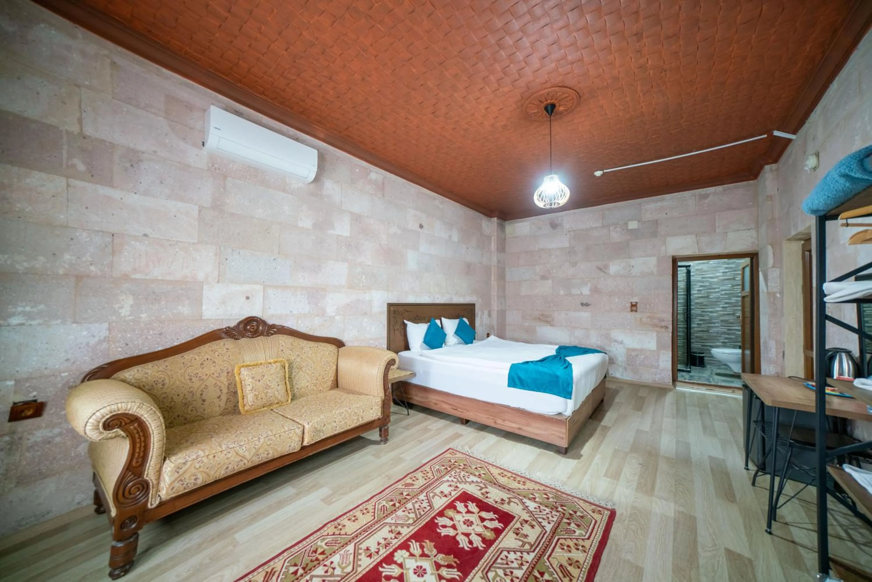 Bed in Azalea Terrace Cave Hotel