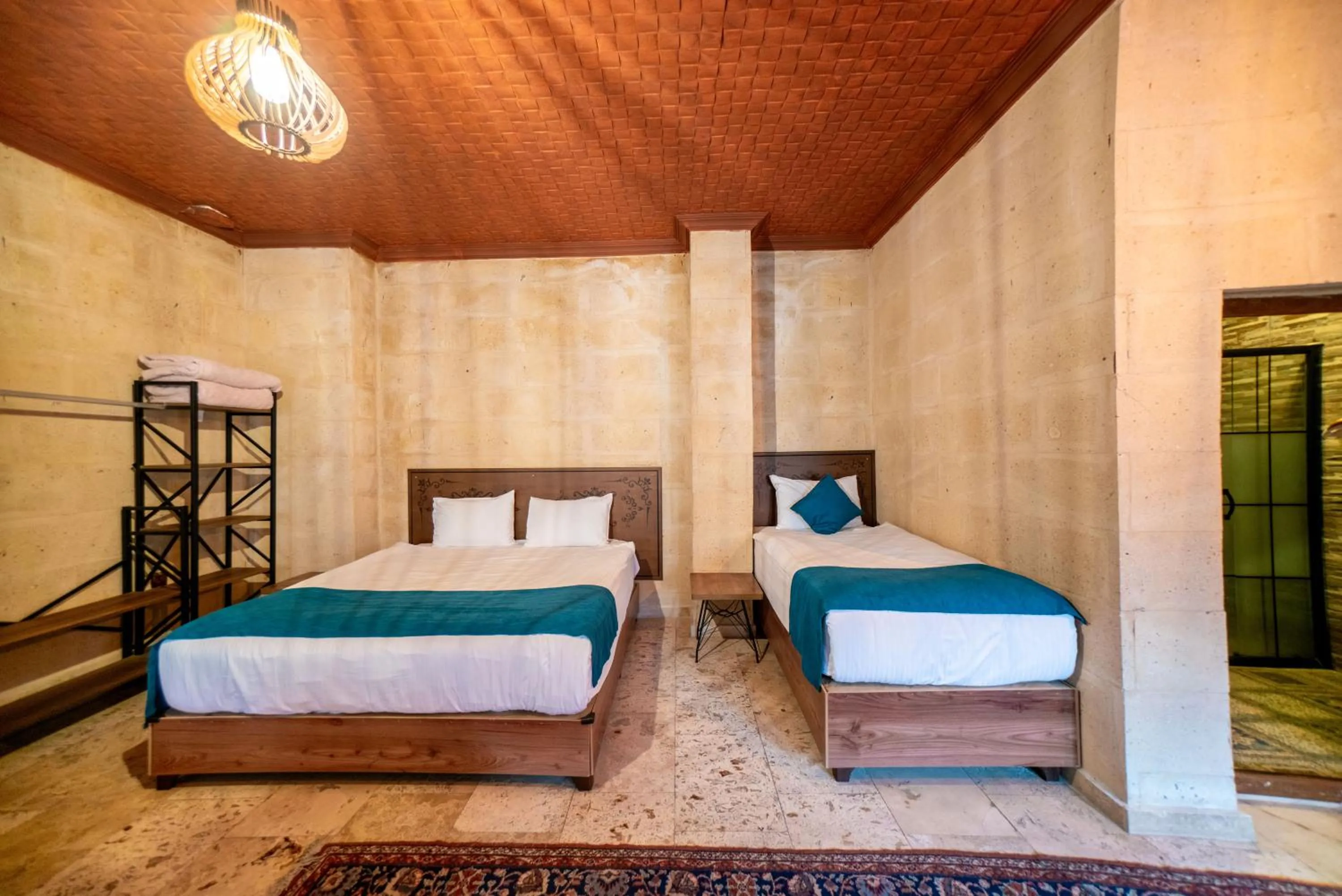 Bed in Azalea Terrace Cave Hotel