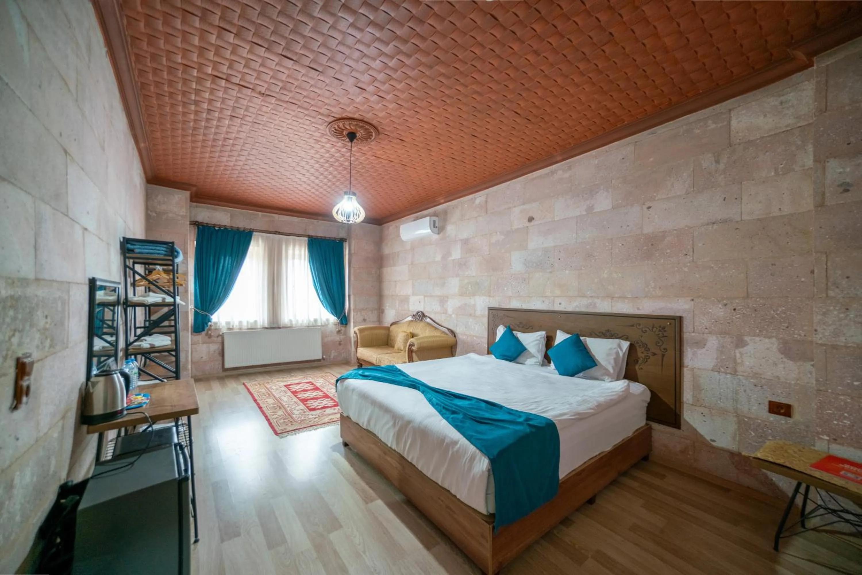 Bed in Azalea Terrace Cave Hotel