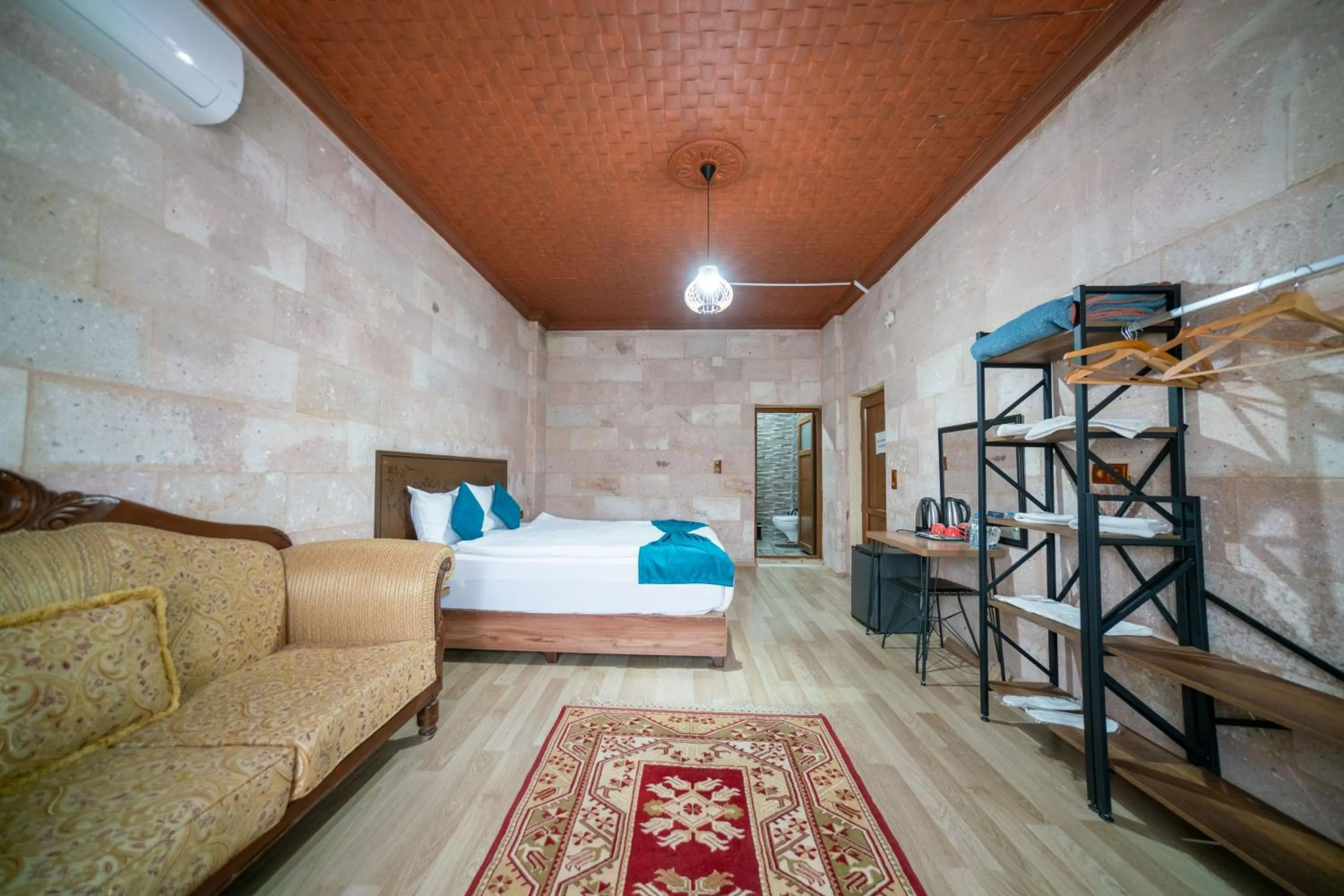 Bed in Azalea Terrace Cave Hotel