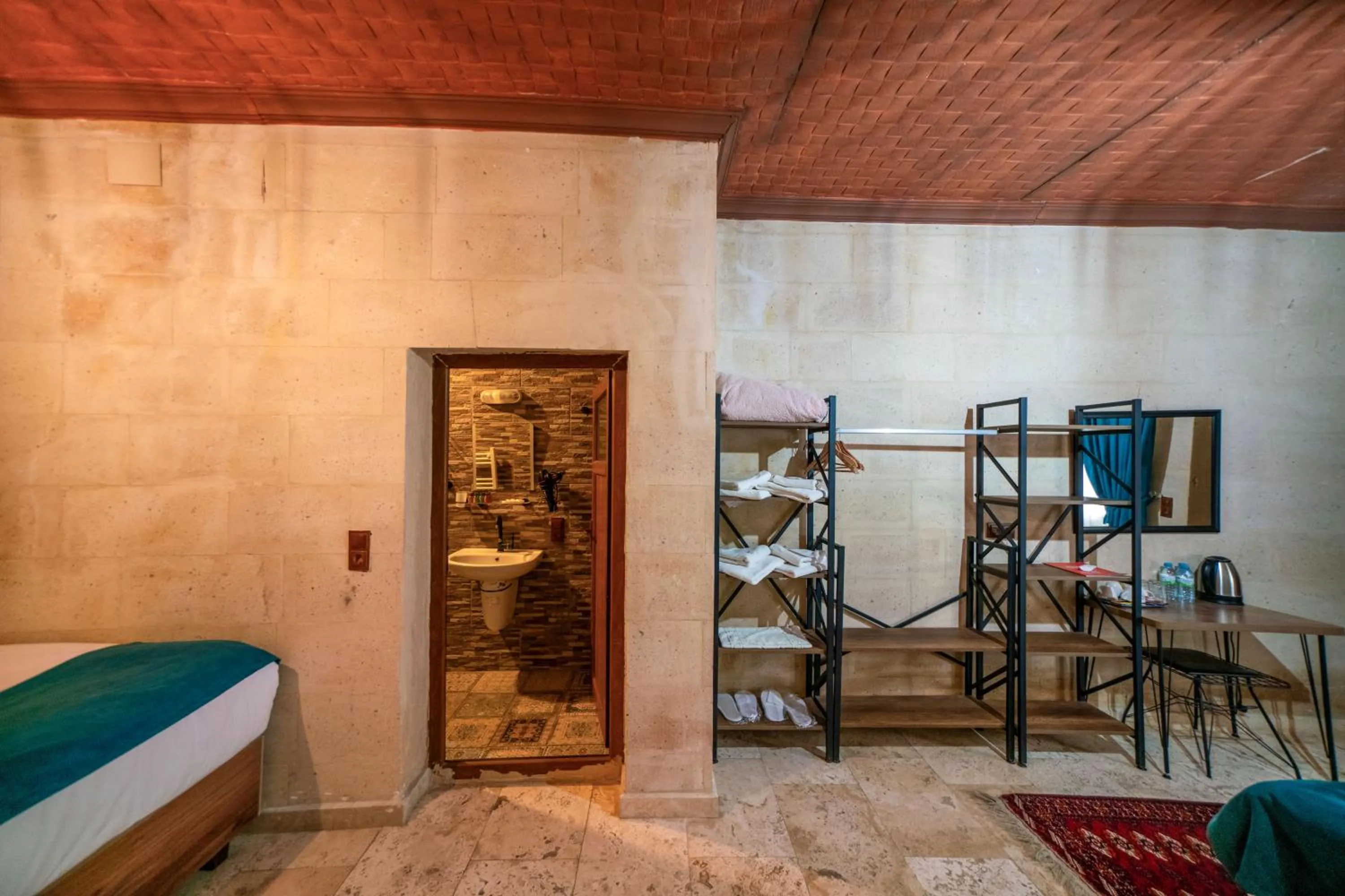 Bed in Azalea Terrace Cave Hotel