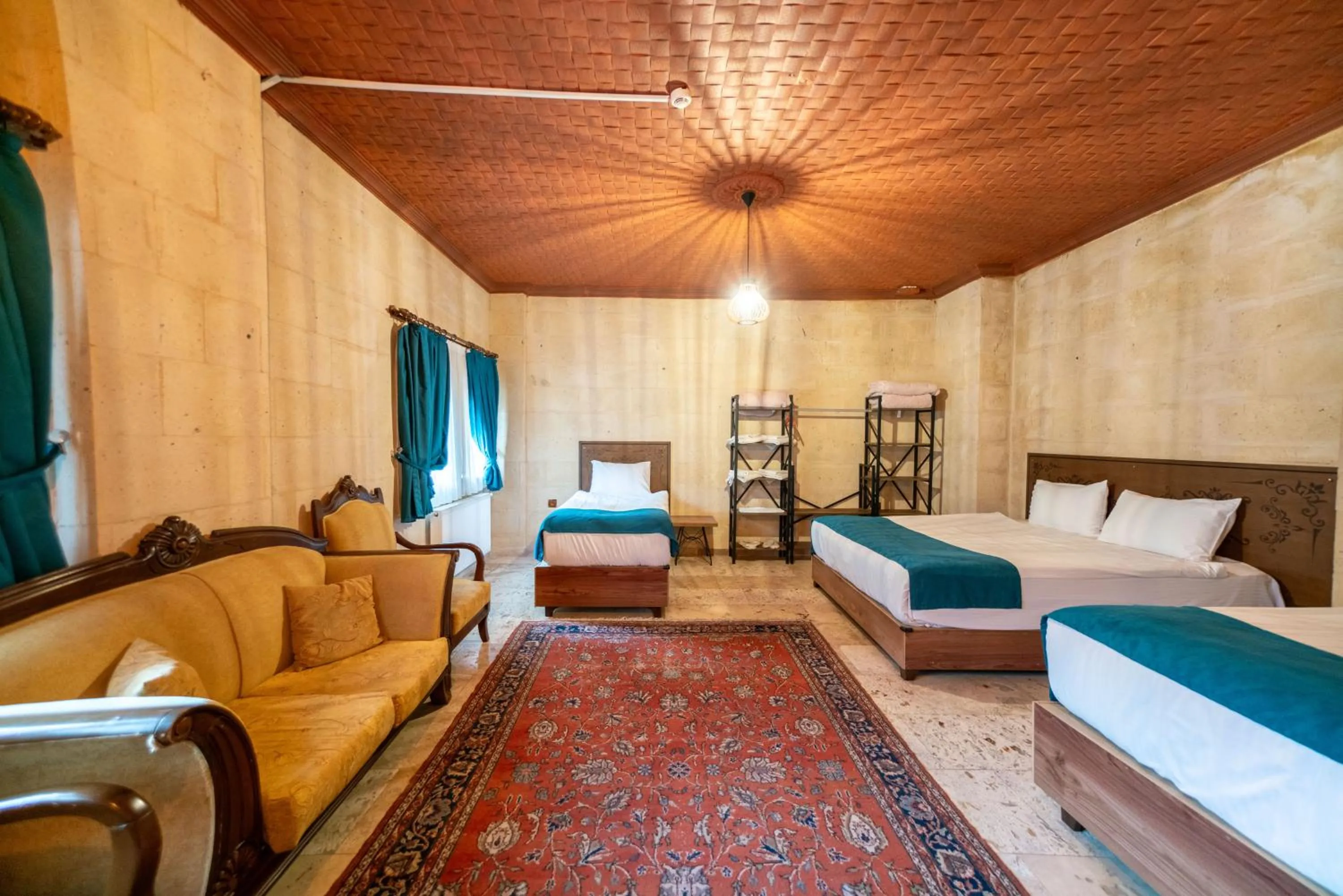 Bed in Azalea Terrace Cave Hotel