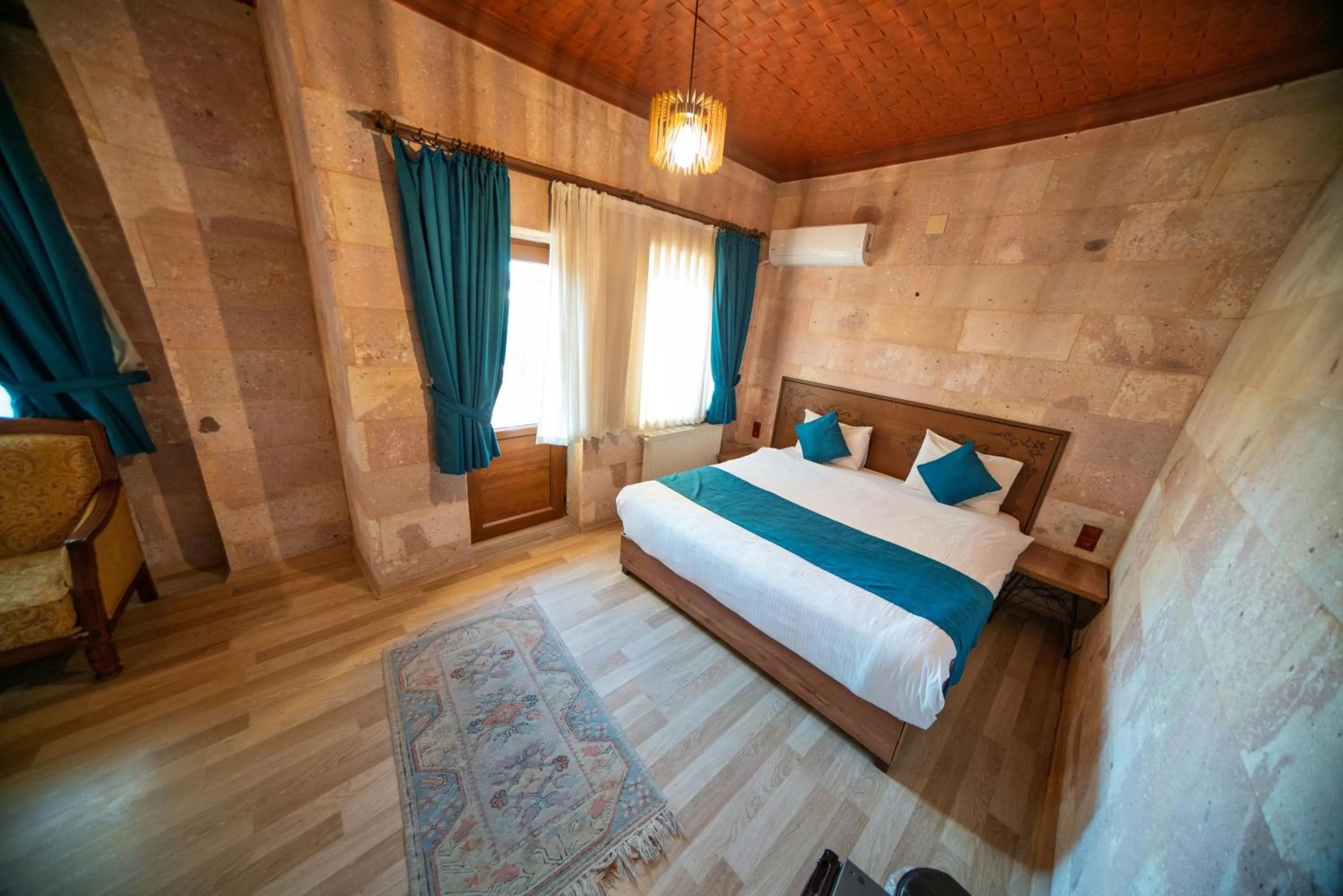 Bed in Azalea Terrace Cave Hotel