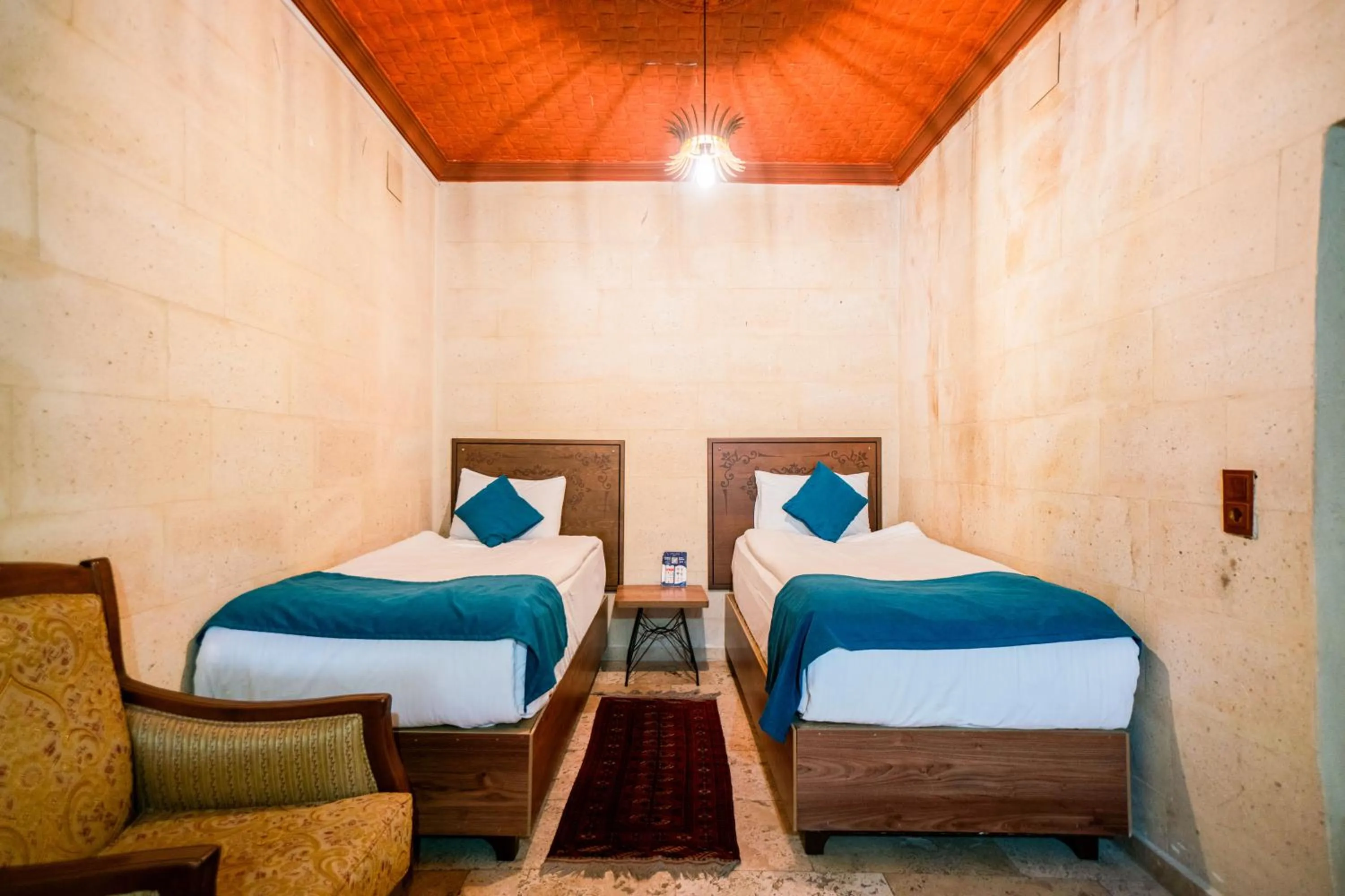 Bed in Azalea Terrace Cave Hotel