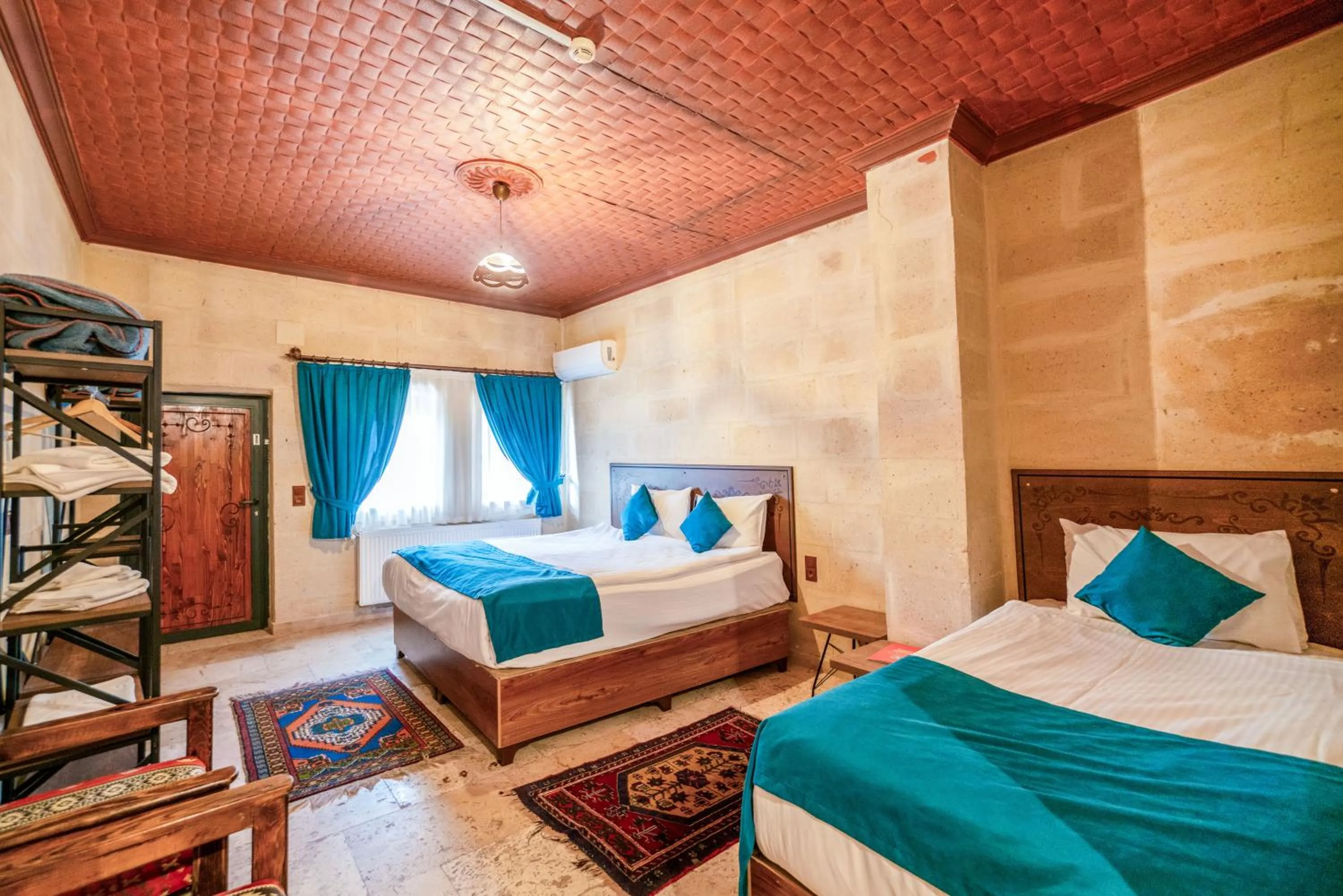 Bed in Azalea Terrace Cave Hotel