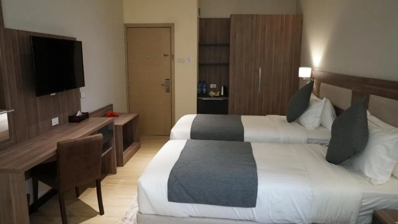 Bedroom, Bed in Triple E Hotel and Spa