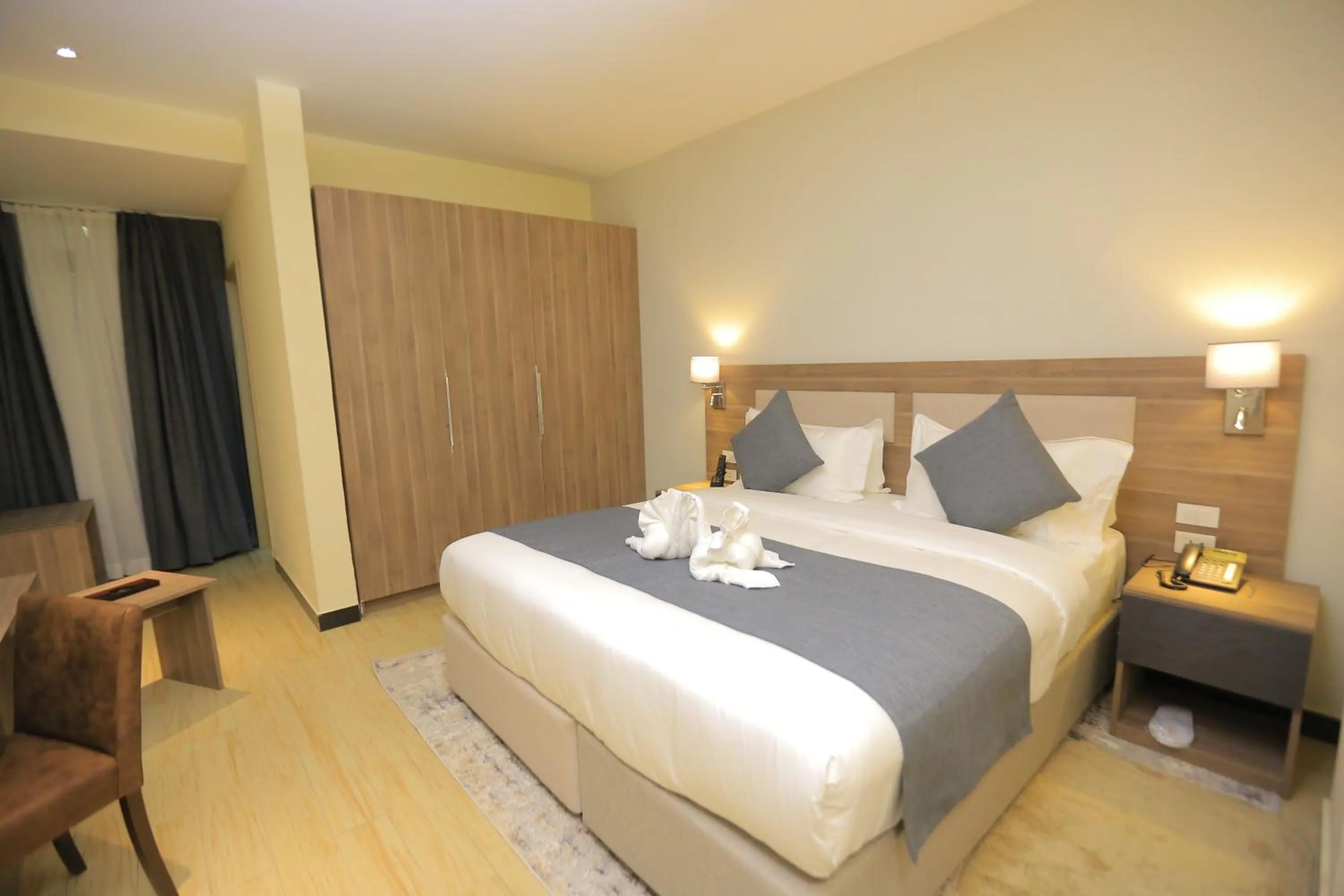 Bed in Triple E Hotel and Spa