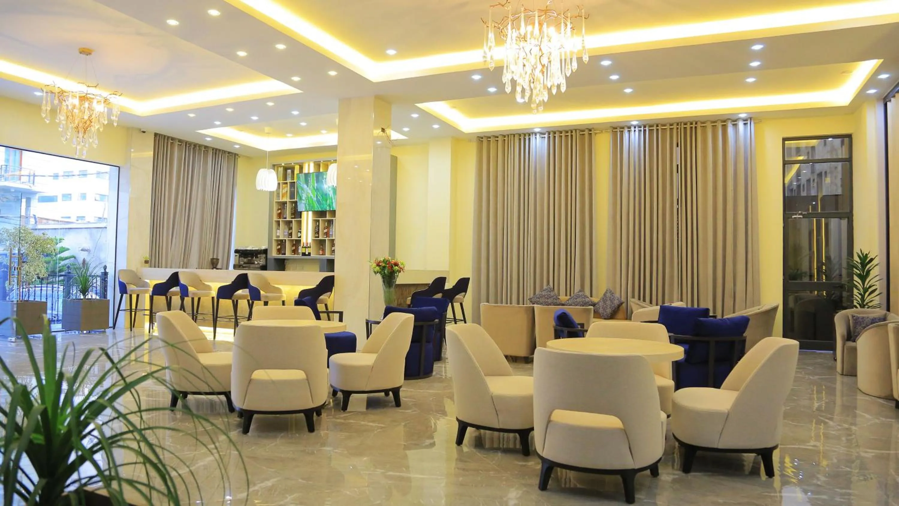 Lounge or bar in Triple E Hotel and Spa
