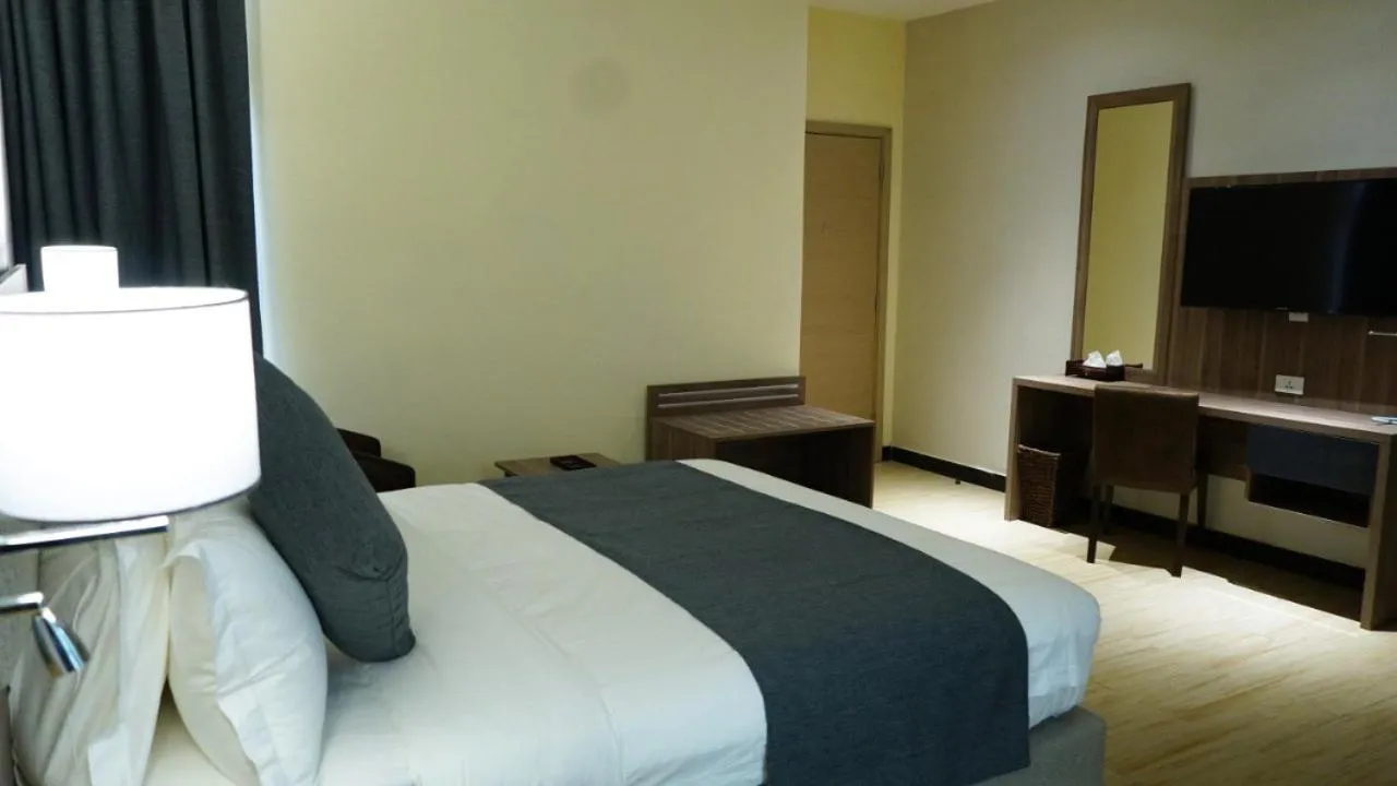 Bedroom, Bed in Triple E Hotel and Spa