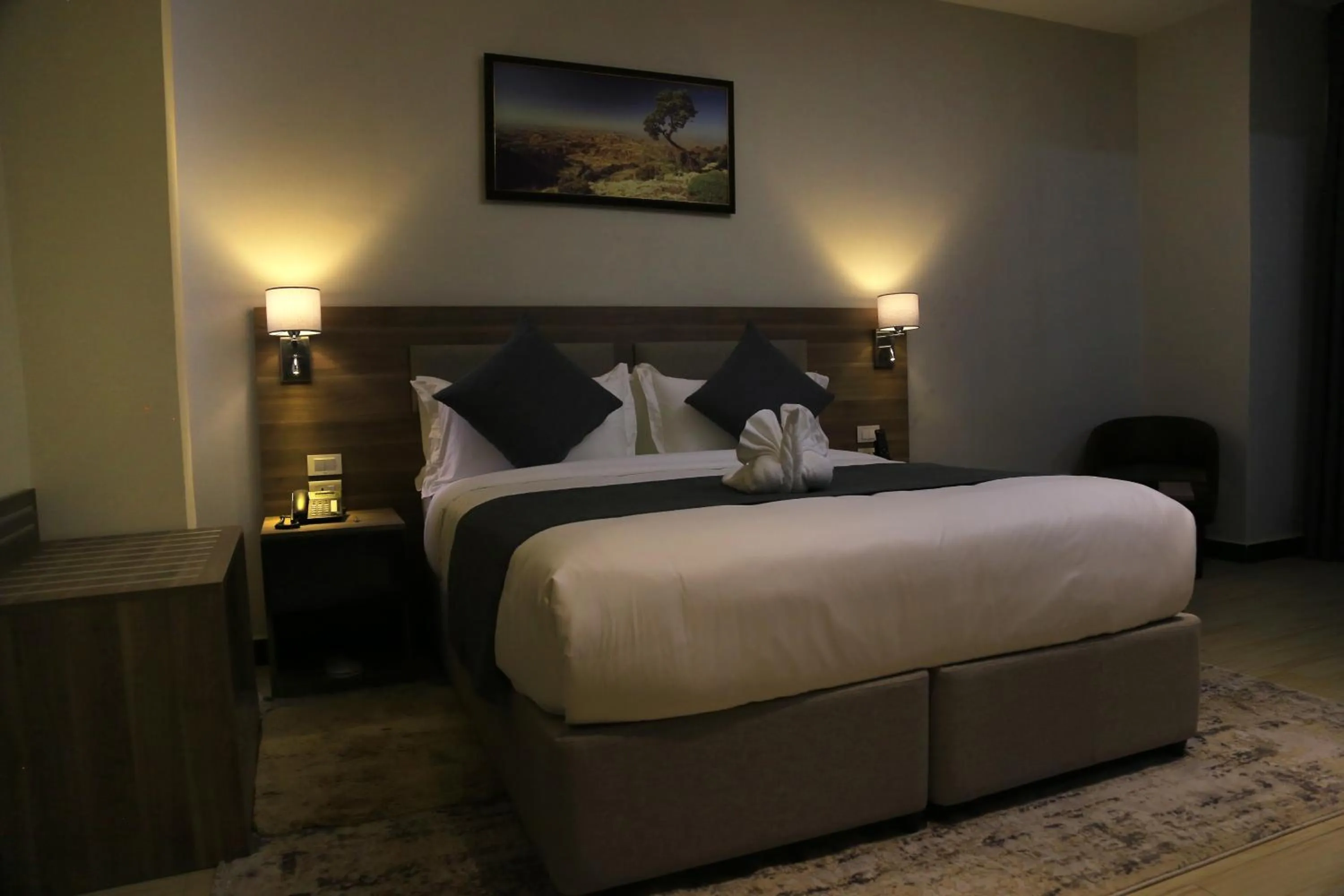 Bed in Triple E Hotel and Spa