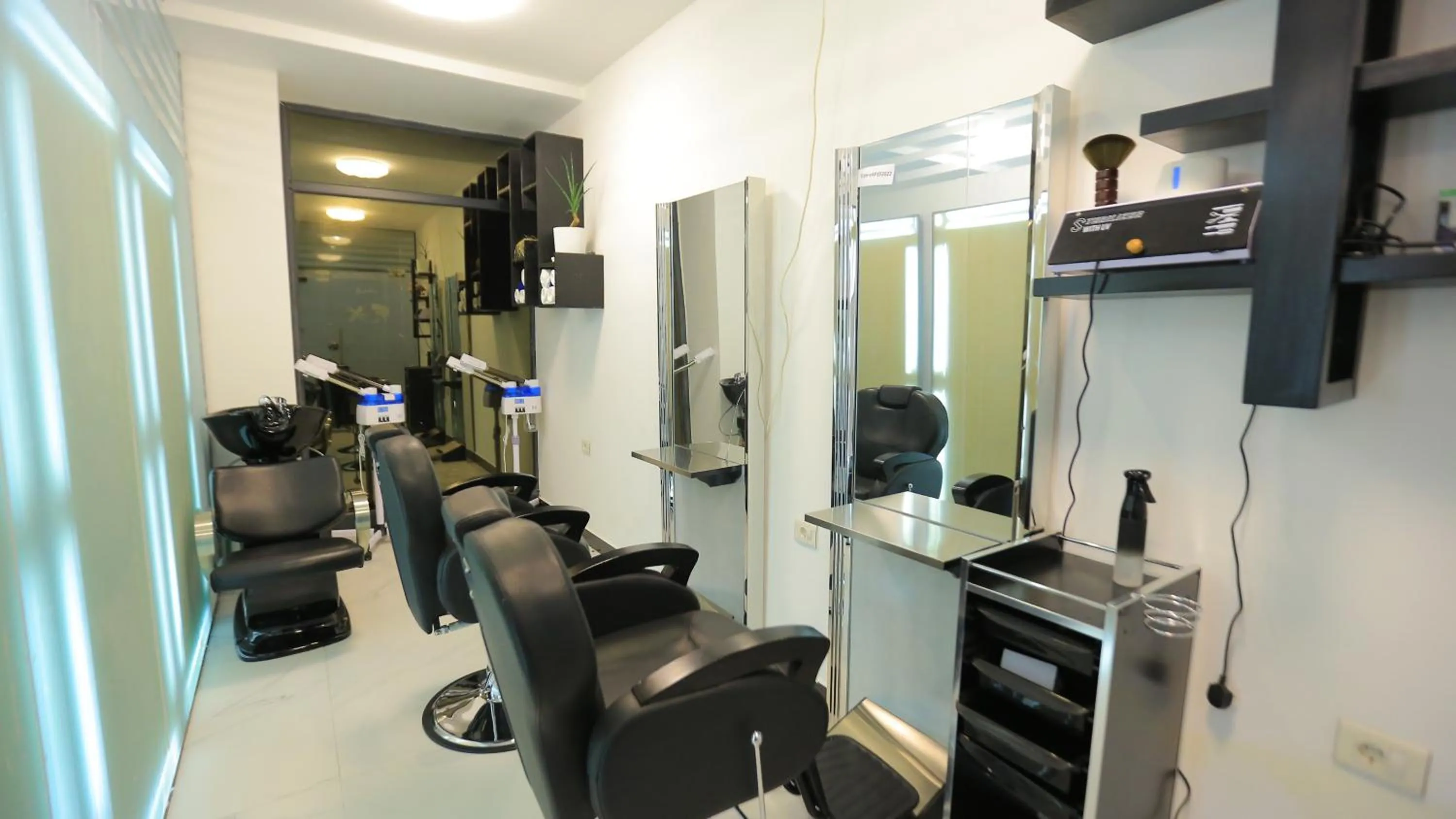 hair dryier in Triple E Hotel and Spa