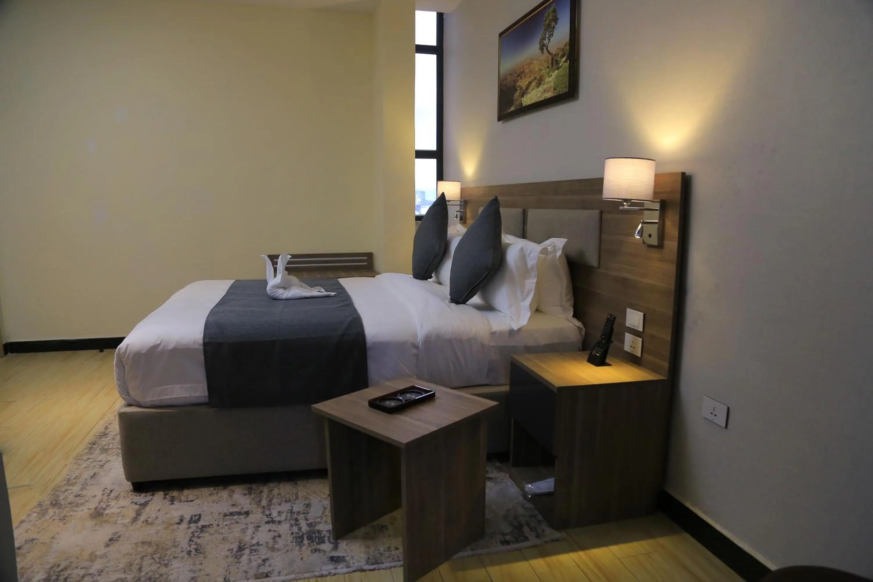 Bed in Triple E Hotel and Spa