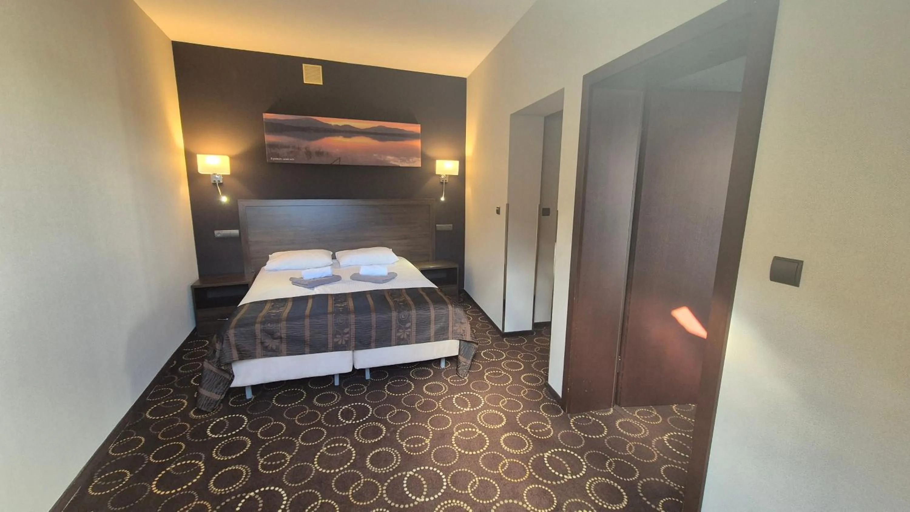 Bed in Hotel Zimnik Luksus Natury Spa & Wellness