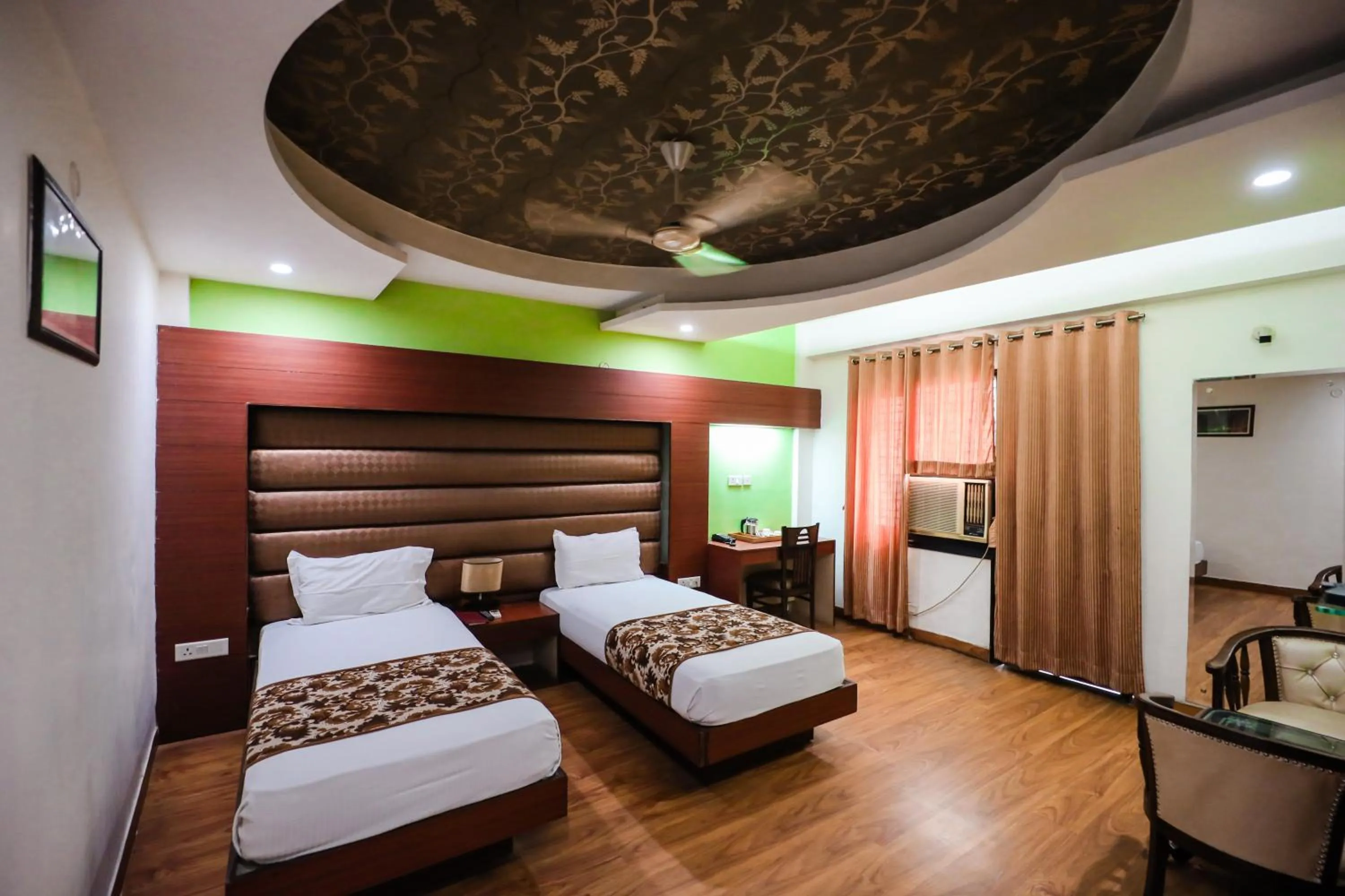 Photo of the whole room, Bed in HOMANSH GALAXY HOTEL