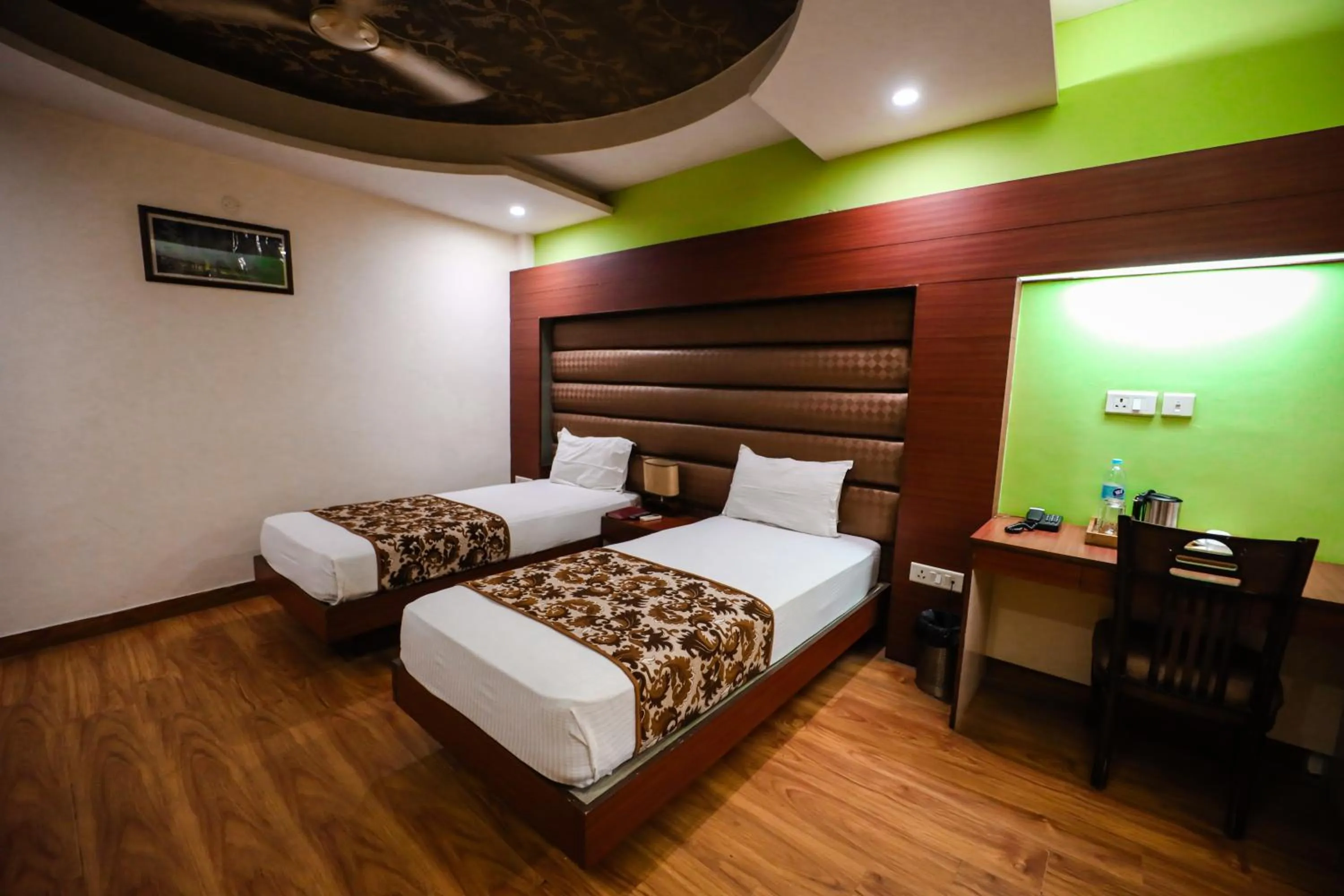 Photo of the whole room, Bed in HOMANSH GALAXY HOTEL