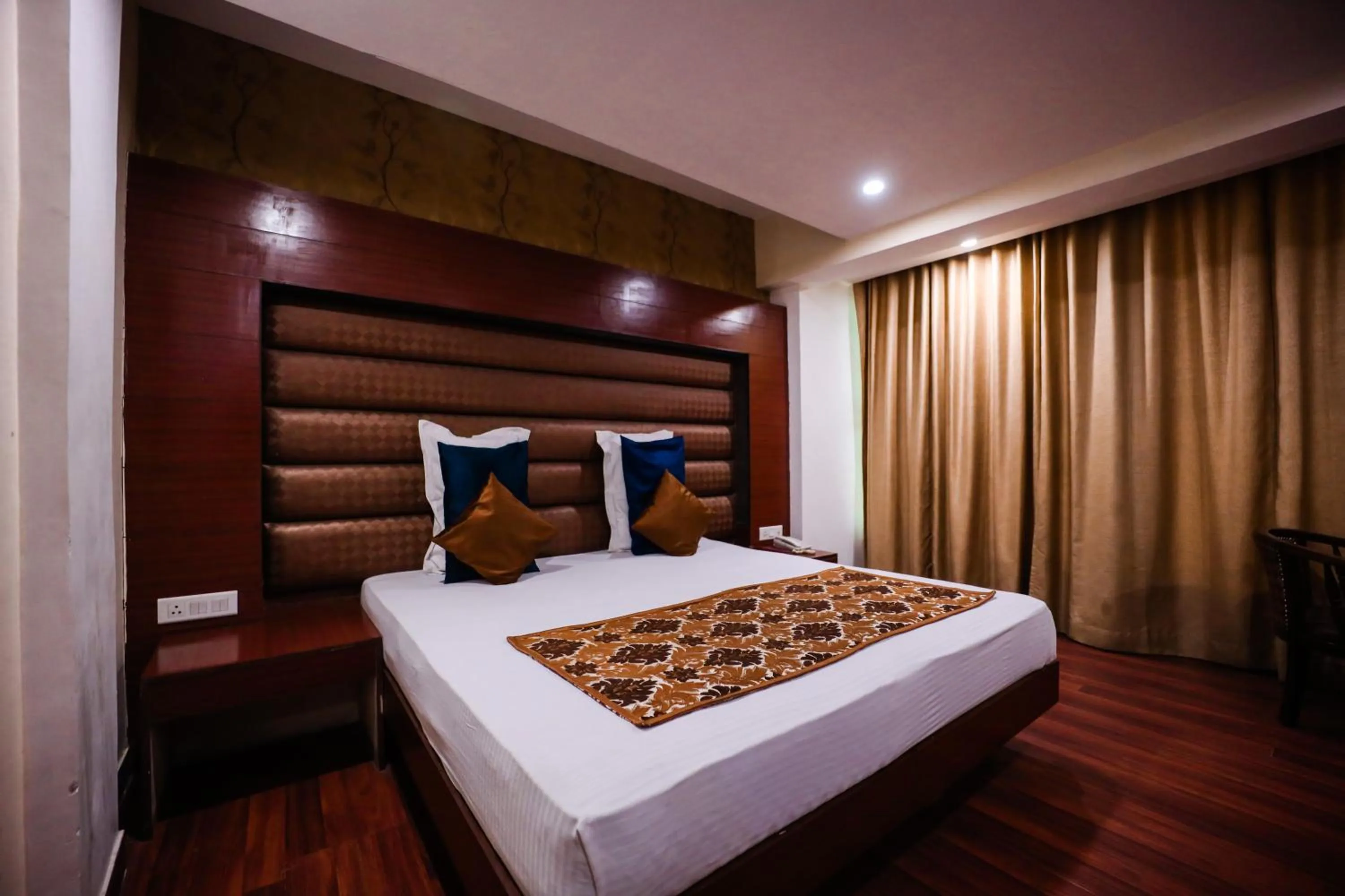 Photo of the whole room, Bed in HOMANSH GALAXY HOTEL