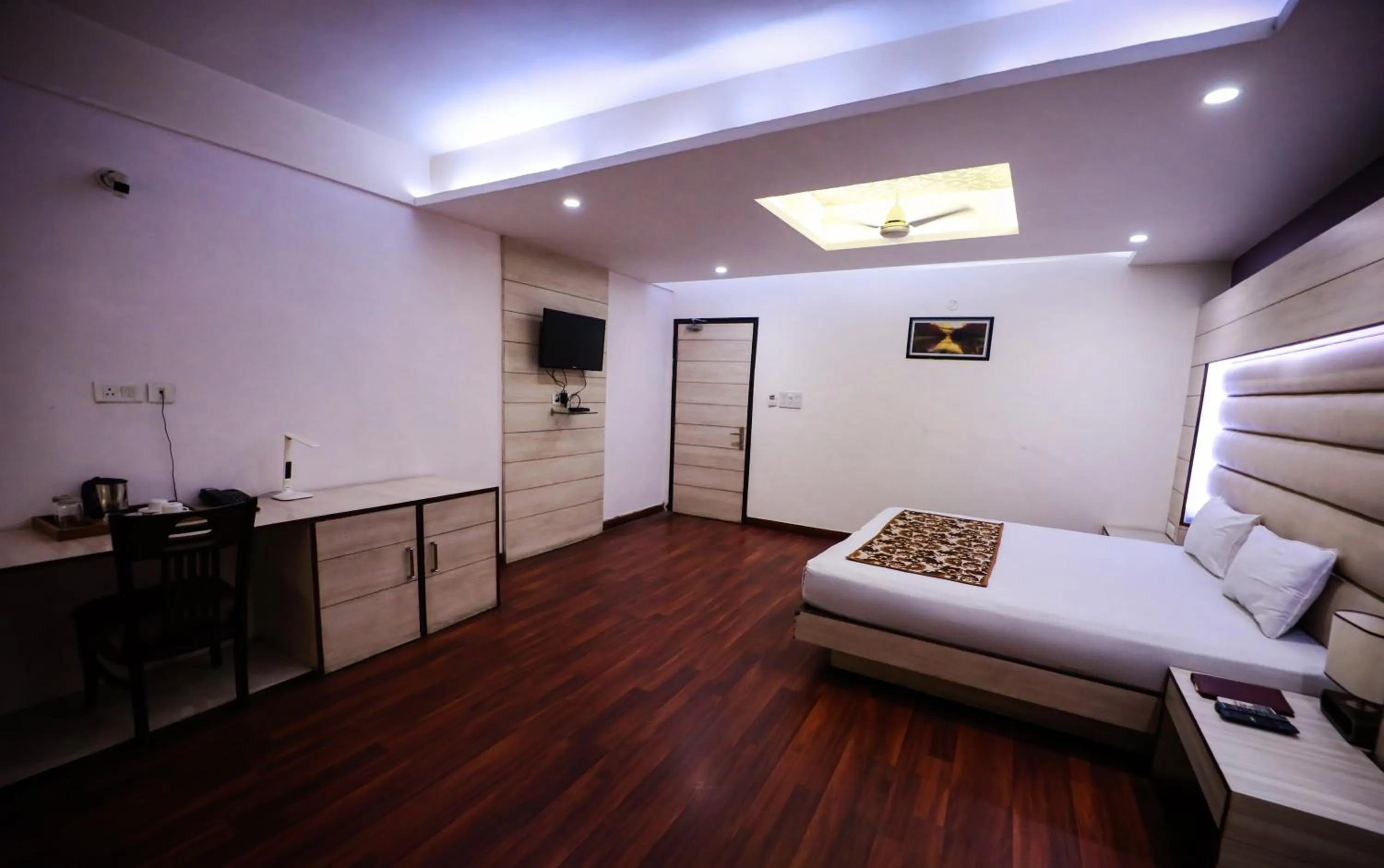 Photo of the whole room, Bed in HOMANSH GALAXY HOTEL