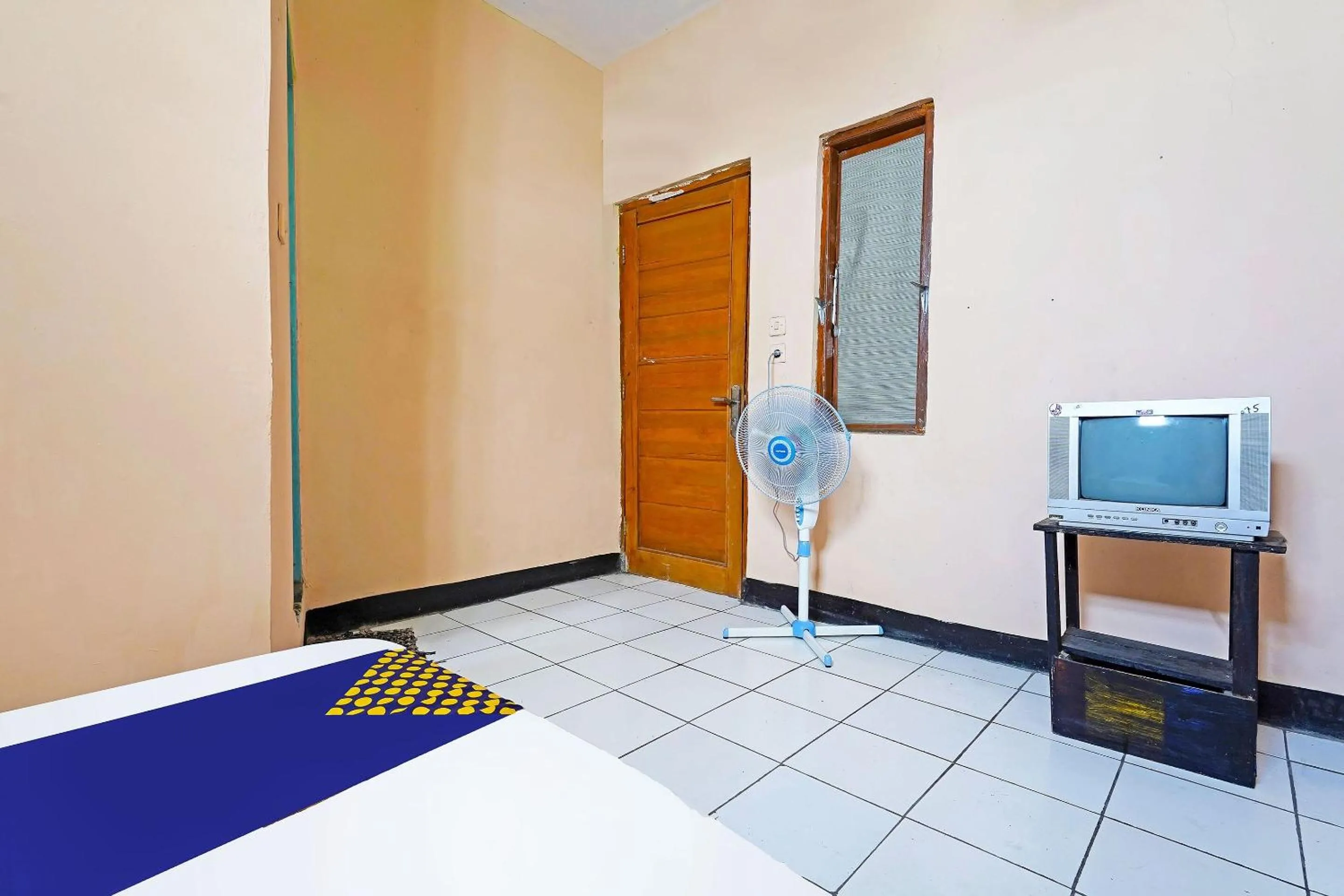 Bedroom in Hotel O Rumah Bundo Syariah