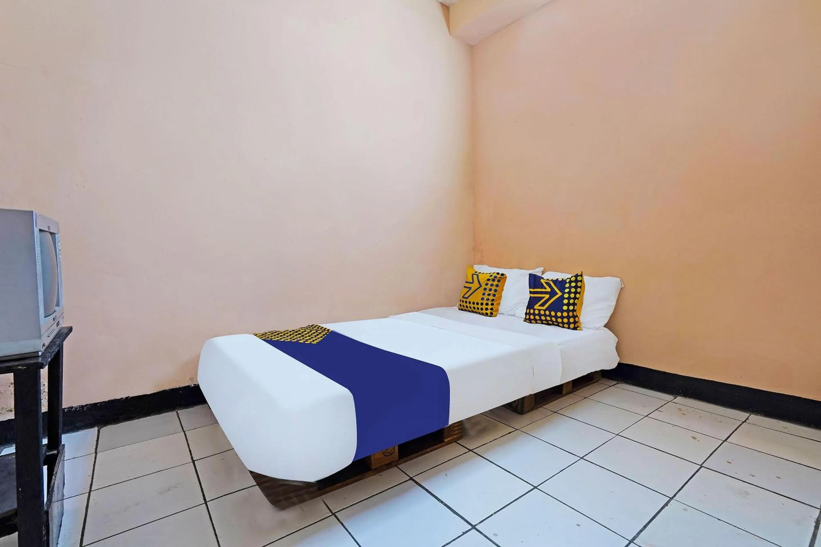 Bedroom in Hotel O Rumah Bundo Syariah