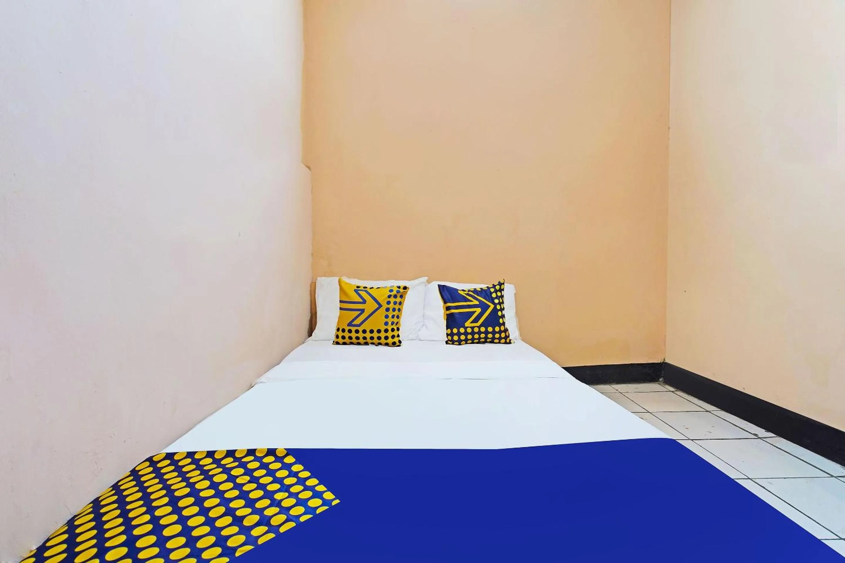 Bedroom in Hotel O Rumah Bundo Syariah