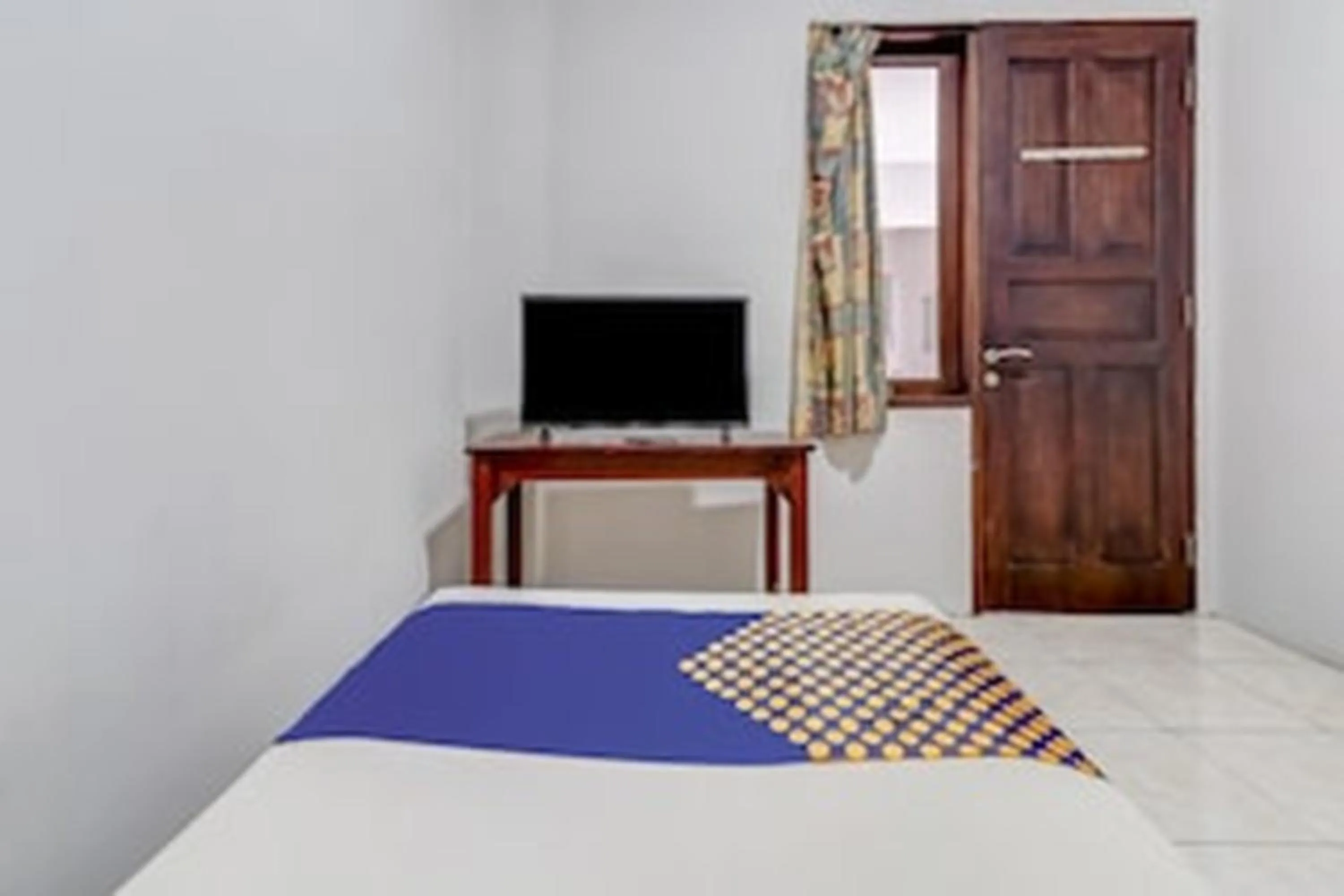 Photo of the whole room, Bed in Hotel O Dago Near Bandung Zoo Formerly Chatter Place