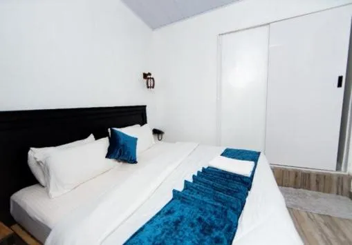 Bedroom, Bed in INZOZI AFRICA HOUSE B&B-Gishushu