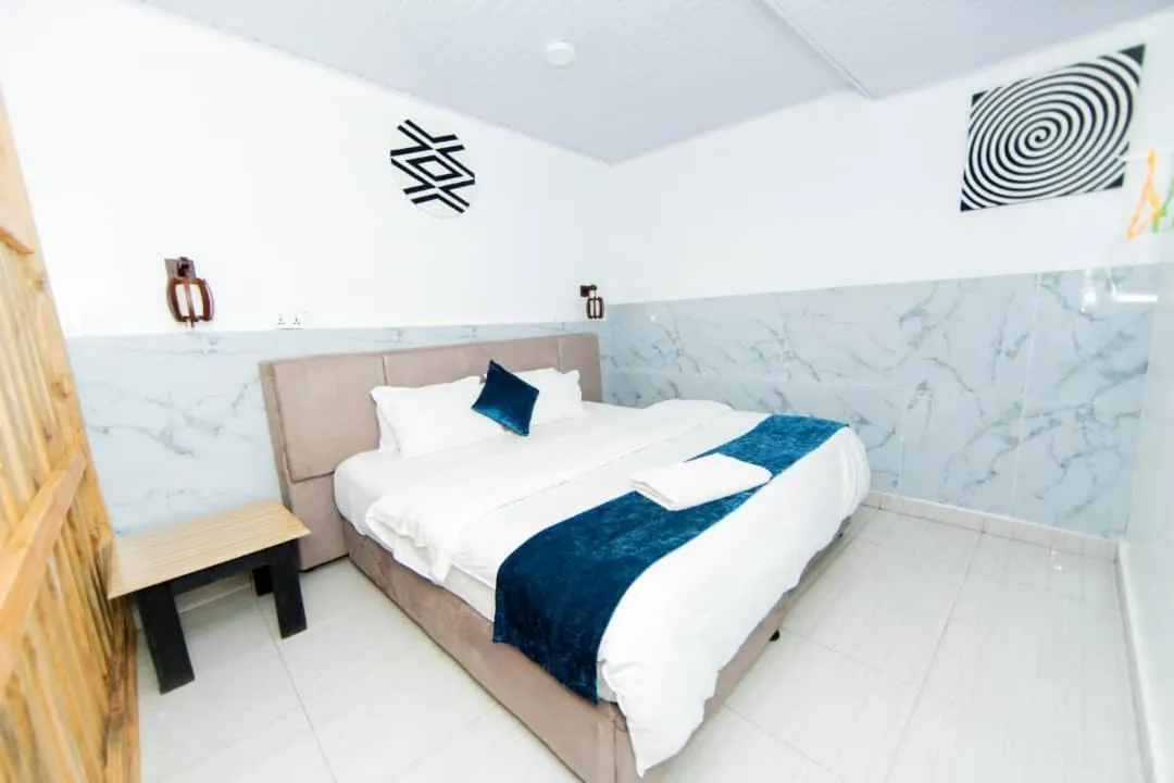 Bedroom, Bed in INZOZI AFRICA HOUSE B&B-Gishushu