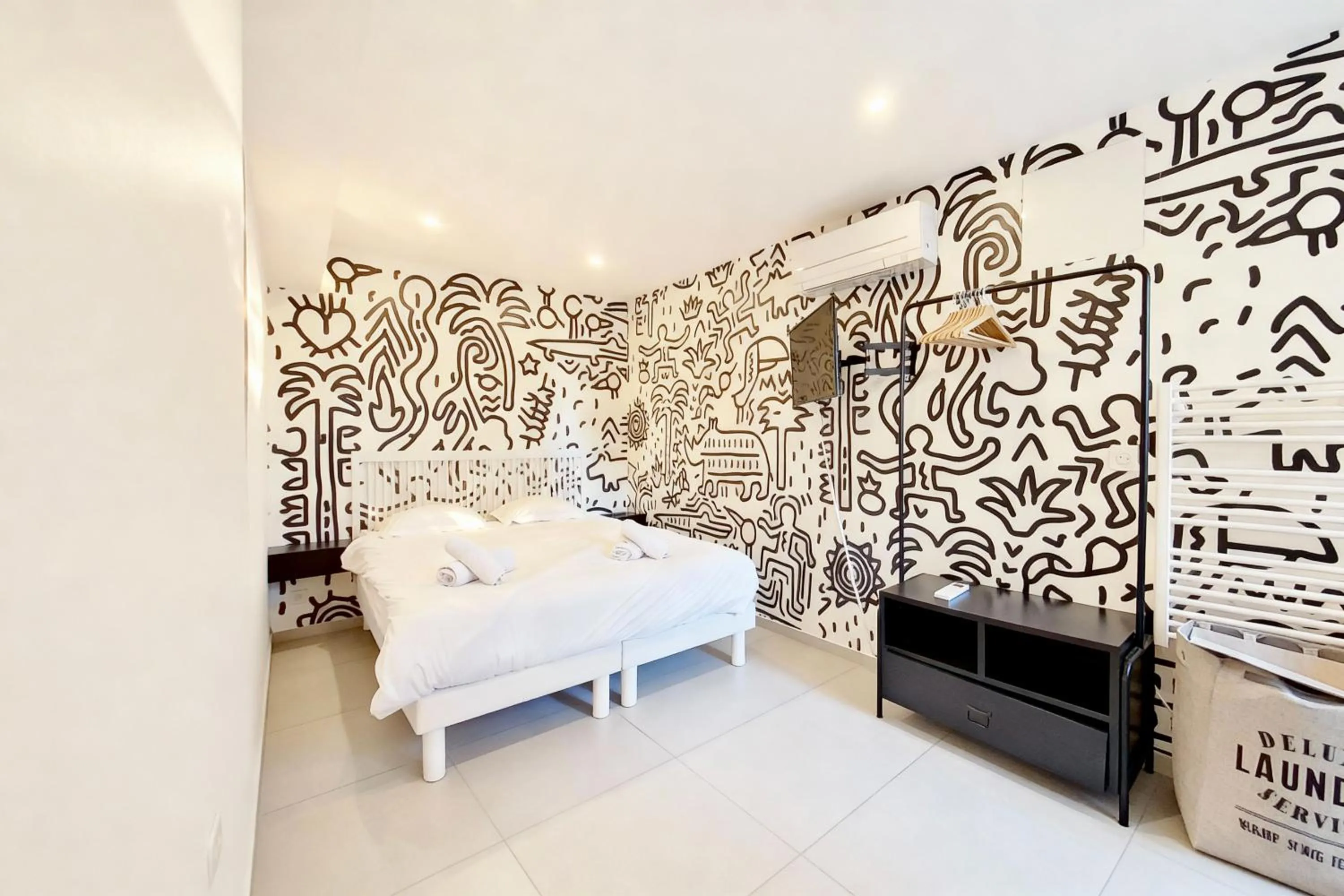 Bed in VILLA MARINA CANNES