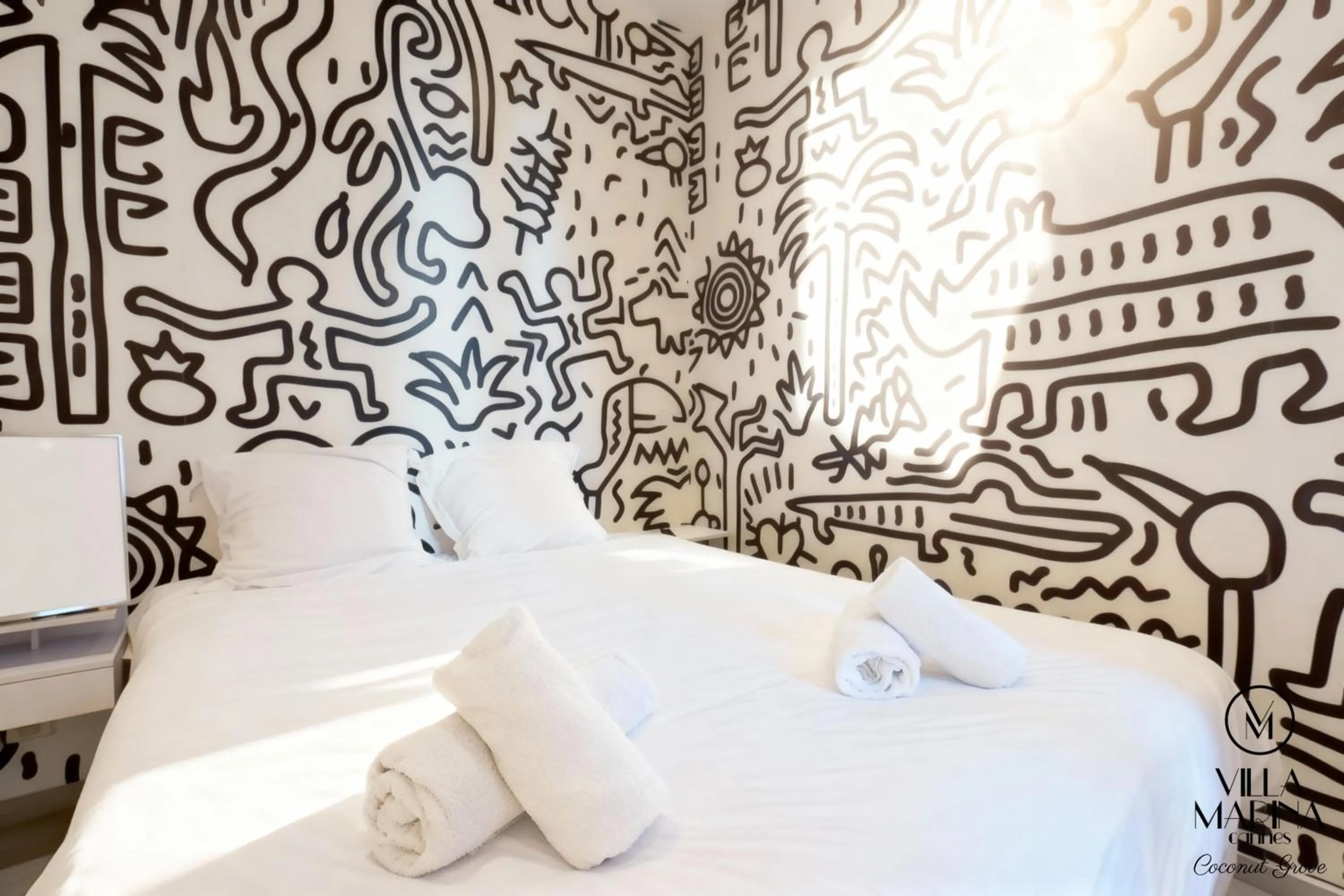 Bed in VILLA MARINA CANNES