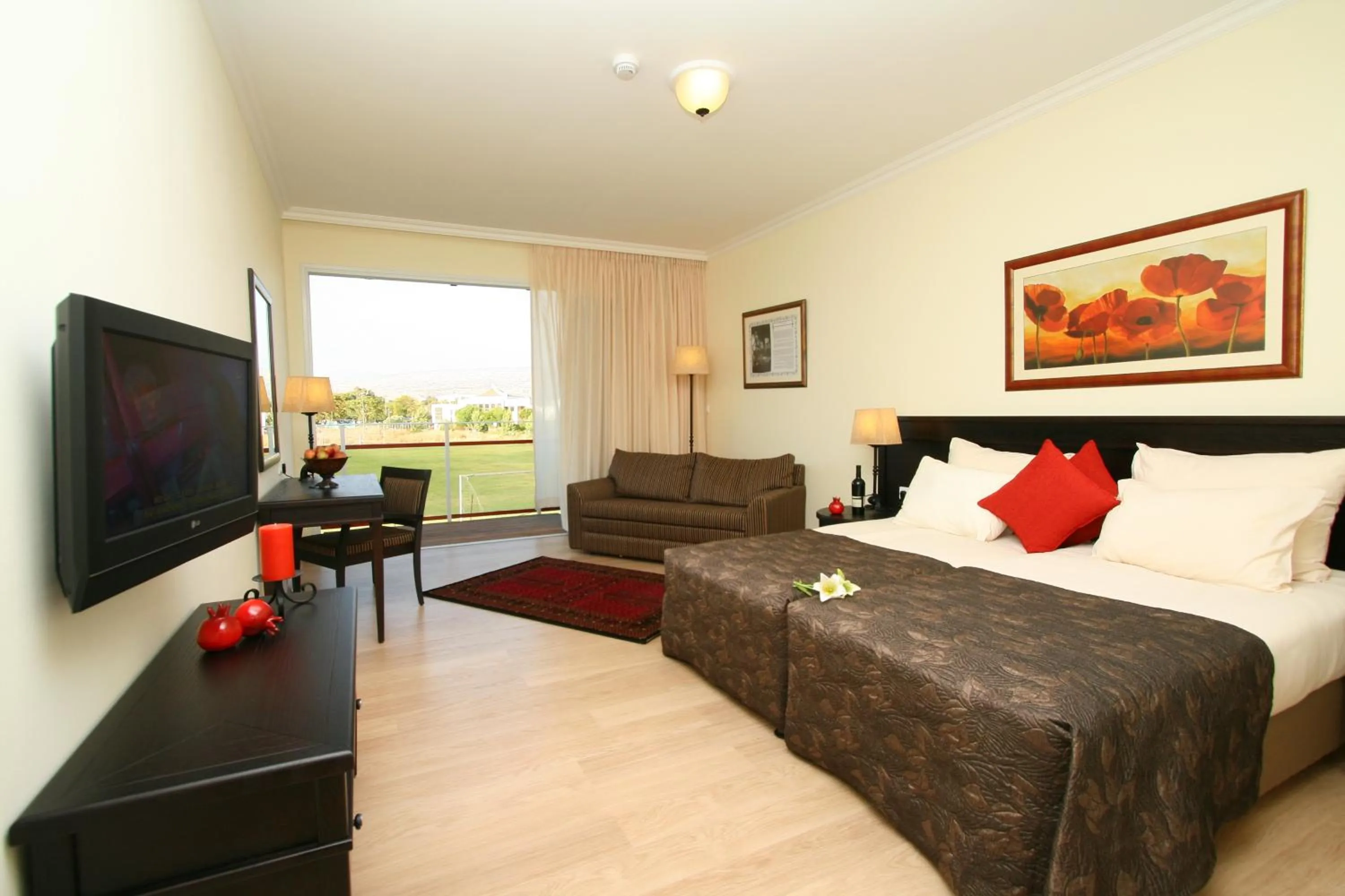 Photo of the whole room, Bed in Pastoral Hotel - Kfar Blum