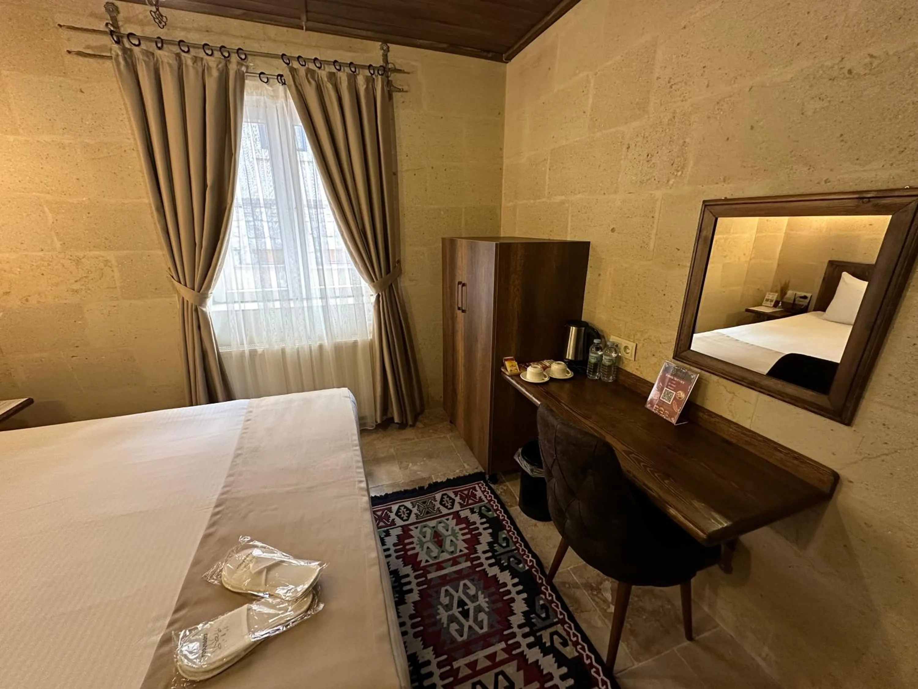 Bed in Virtus Cappadocia Hotel Göreme