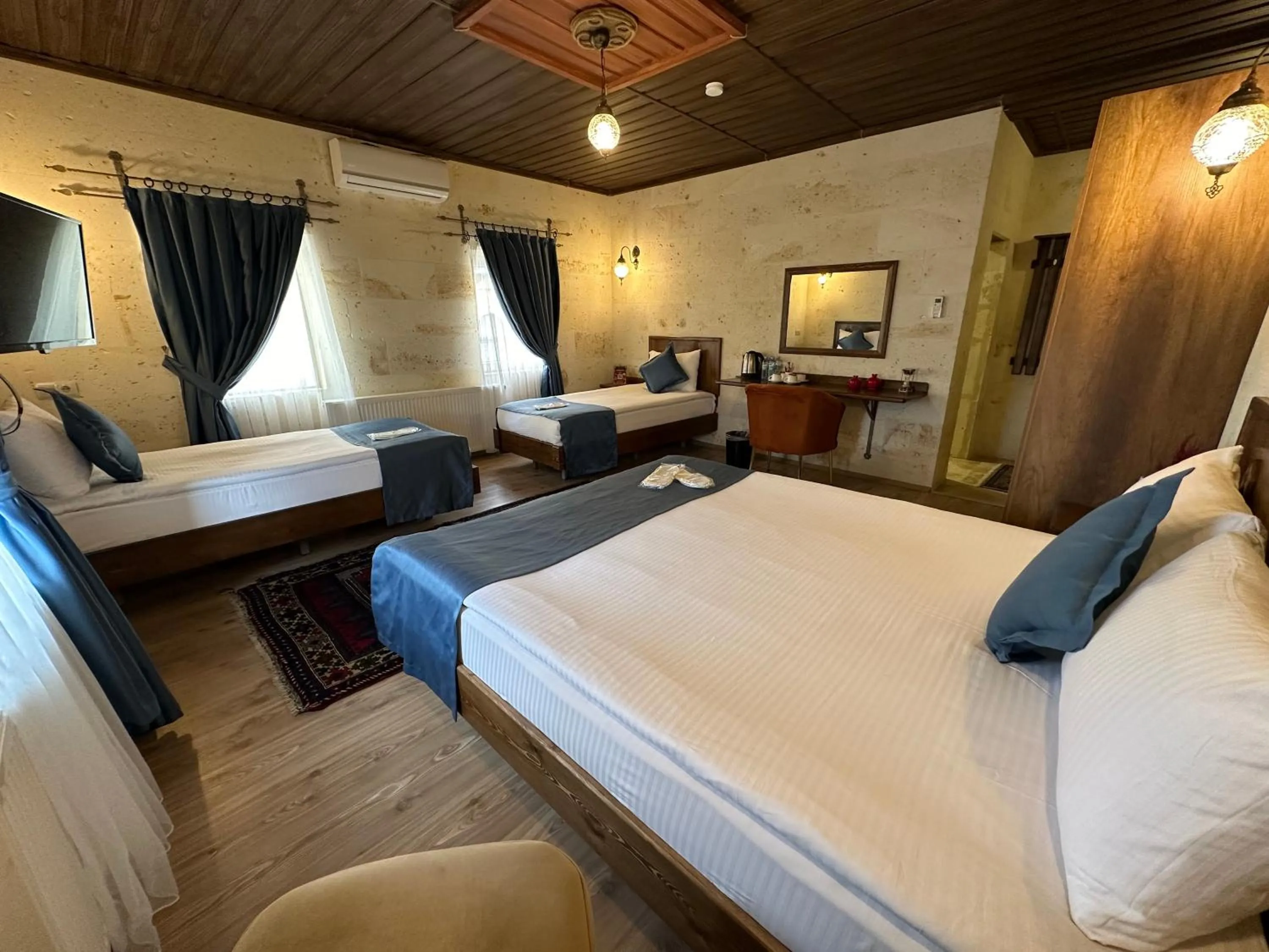 Bed in Virtus Cappadocia Hotel Göreme