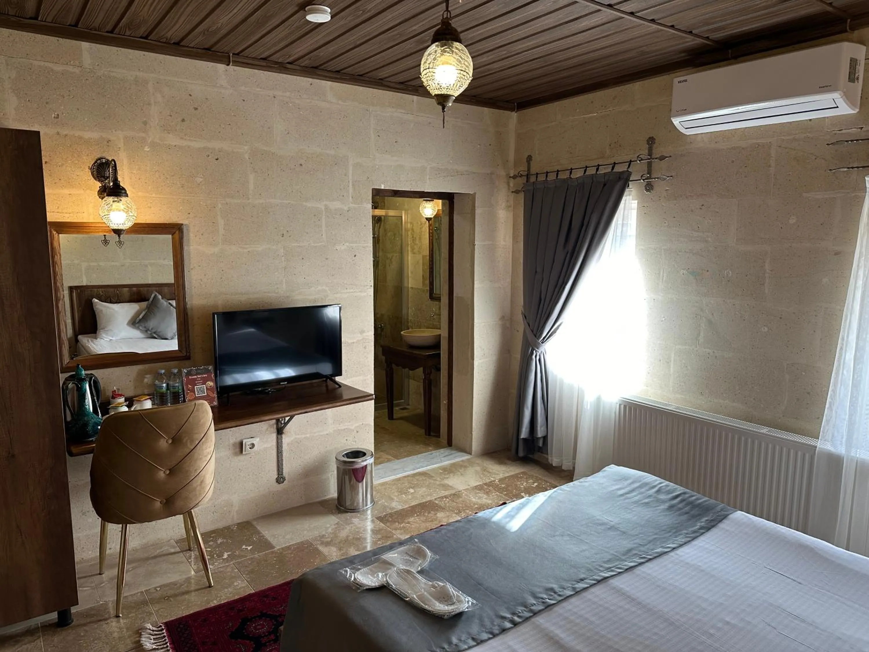 Bed in Virtus Cappadocia Hotel Göreme