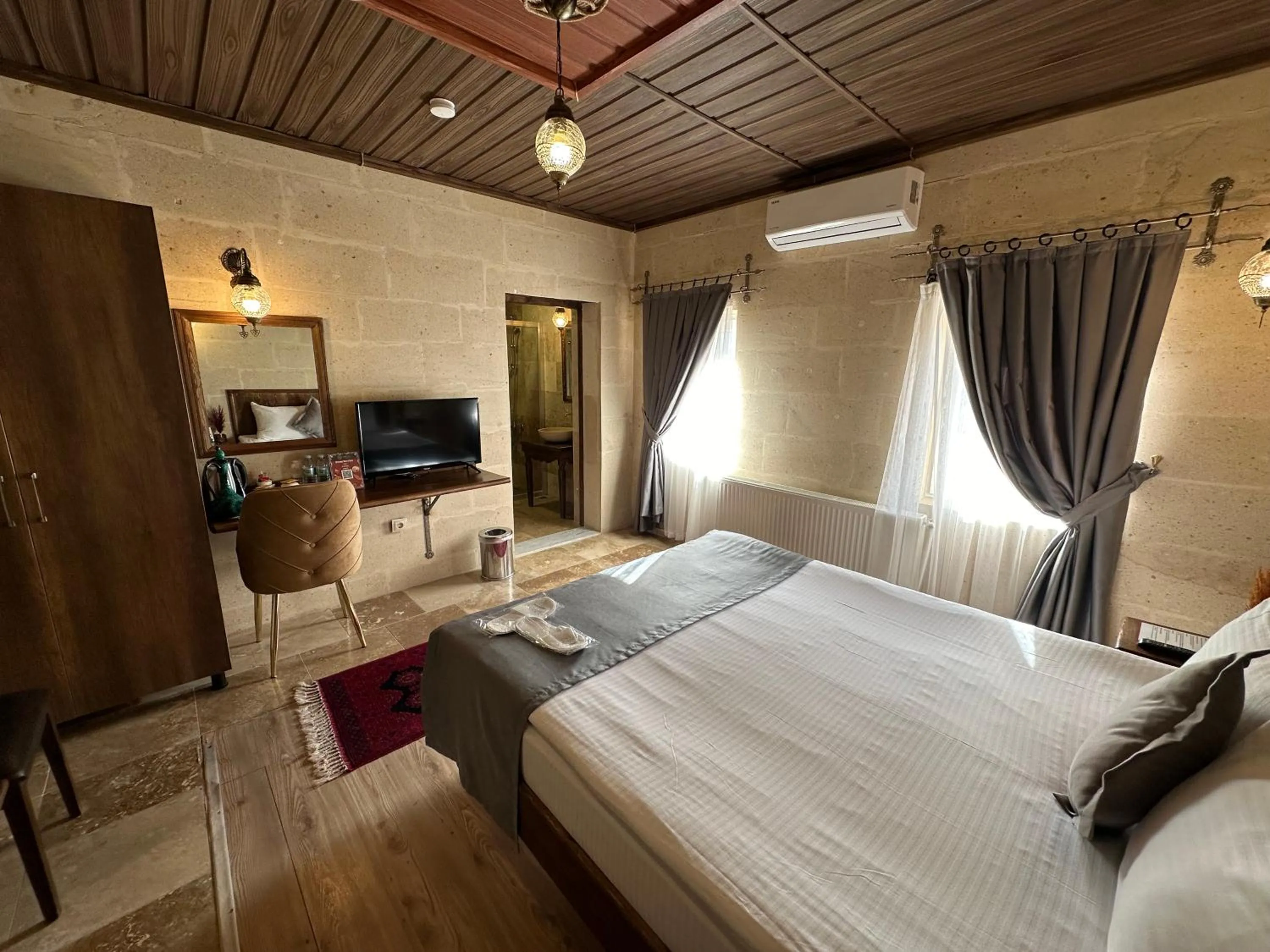 Bed in Virtus Cappadocia Hotel Göreme