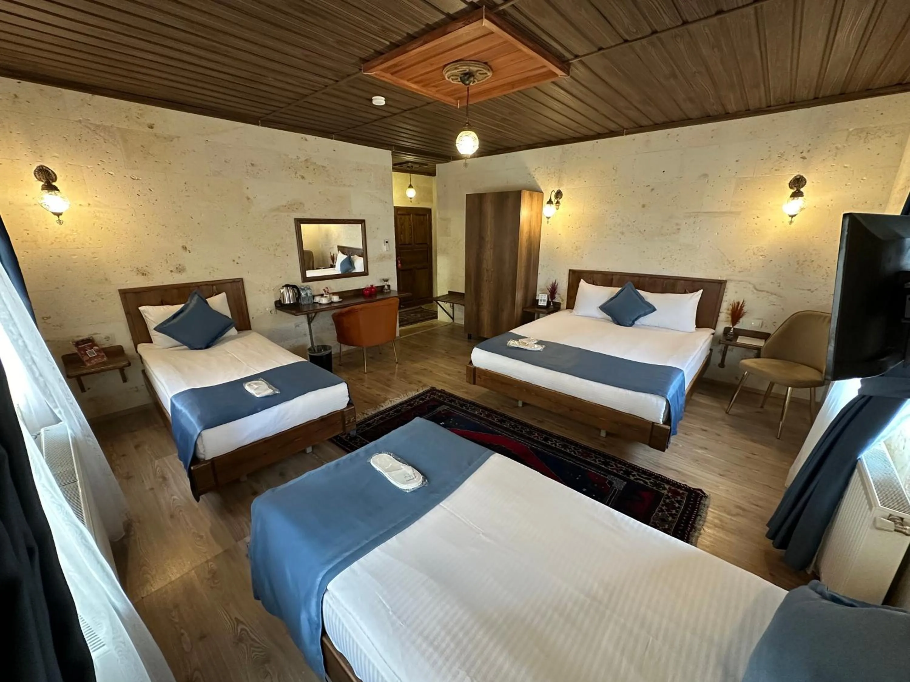 Bed in Virtus Cappadocia Hotel Göreme