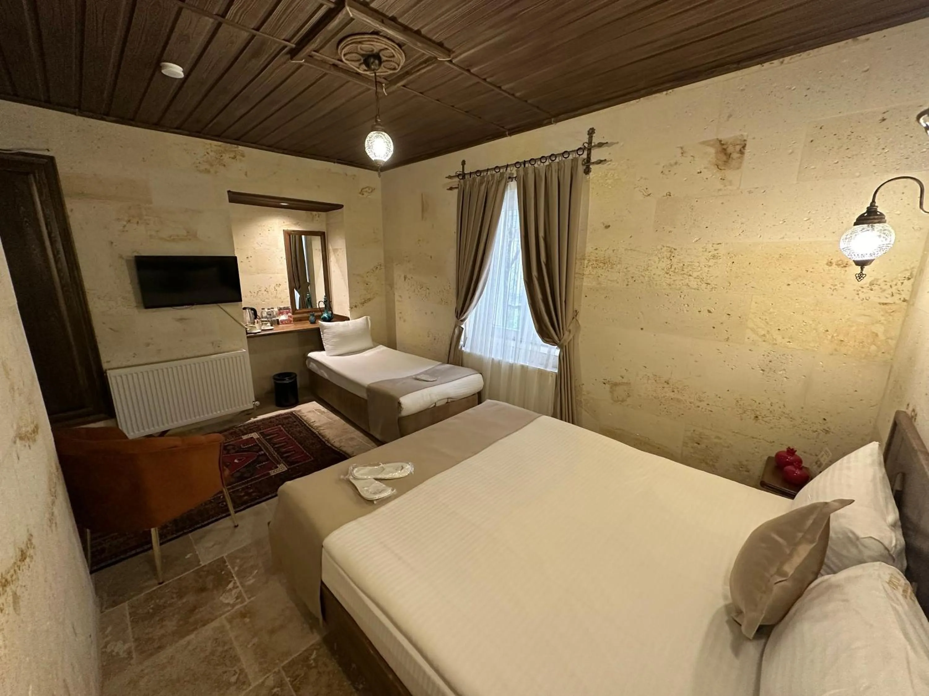 Bed in Virtus Cappadocia Hotel Göreme