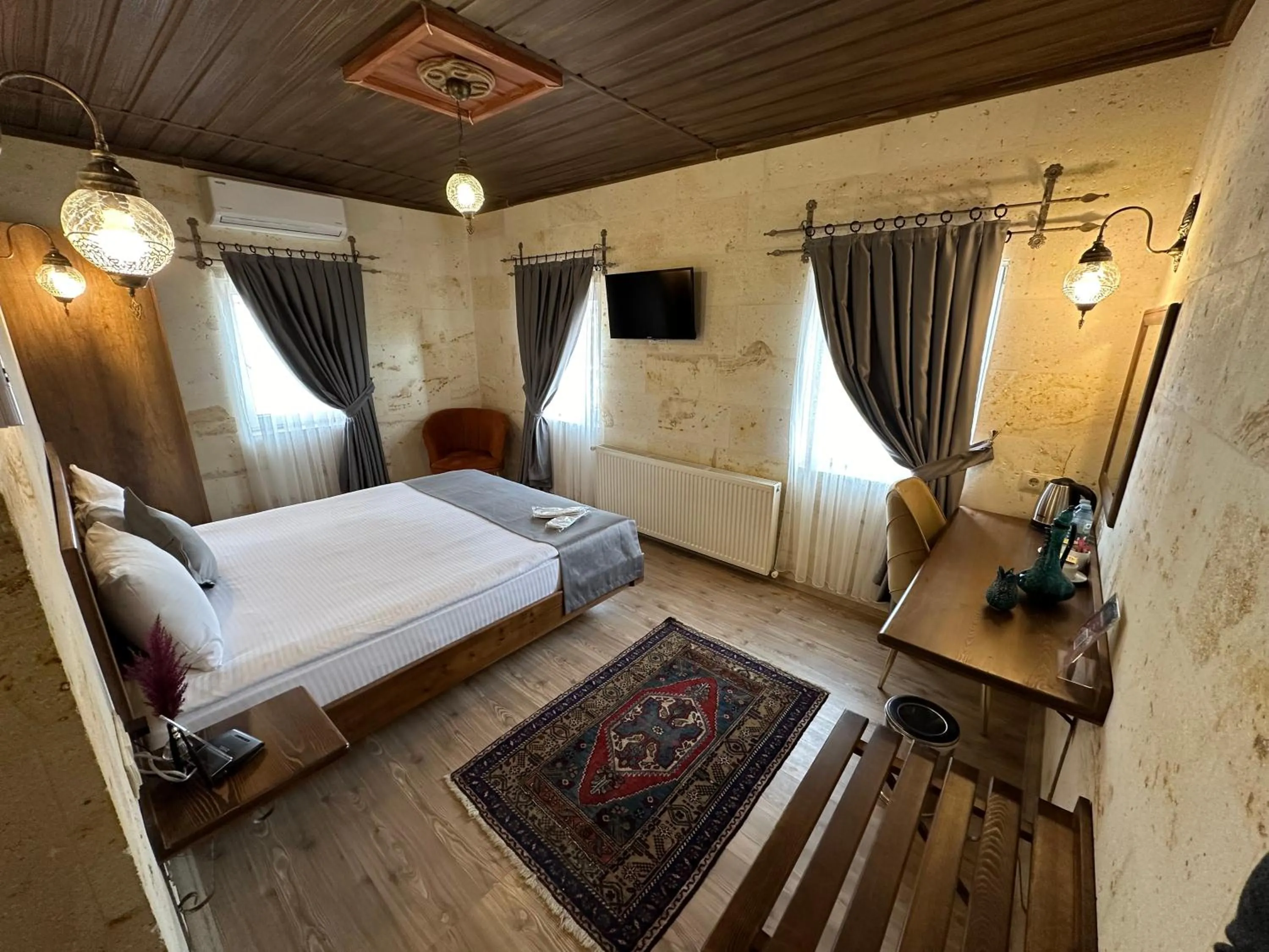 Bed in Virtus Cappadocia Hotel Göreme