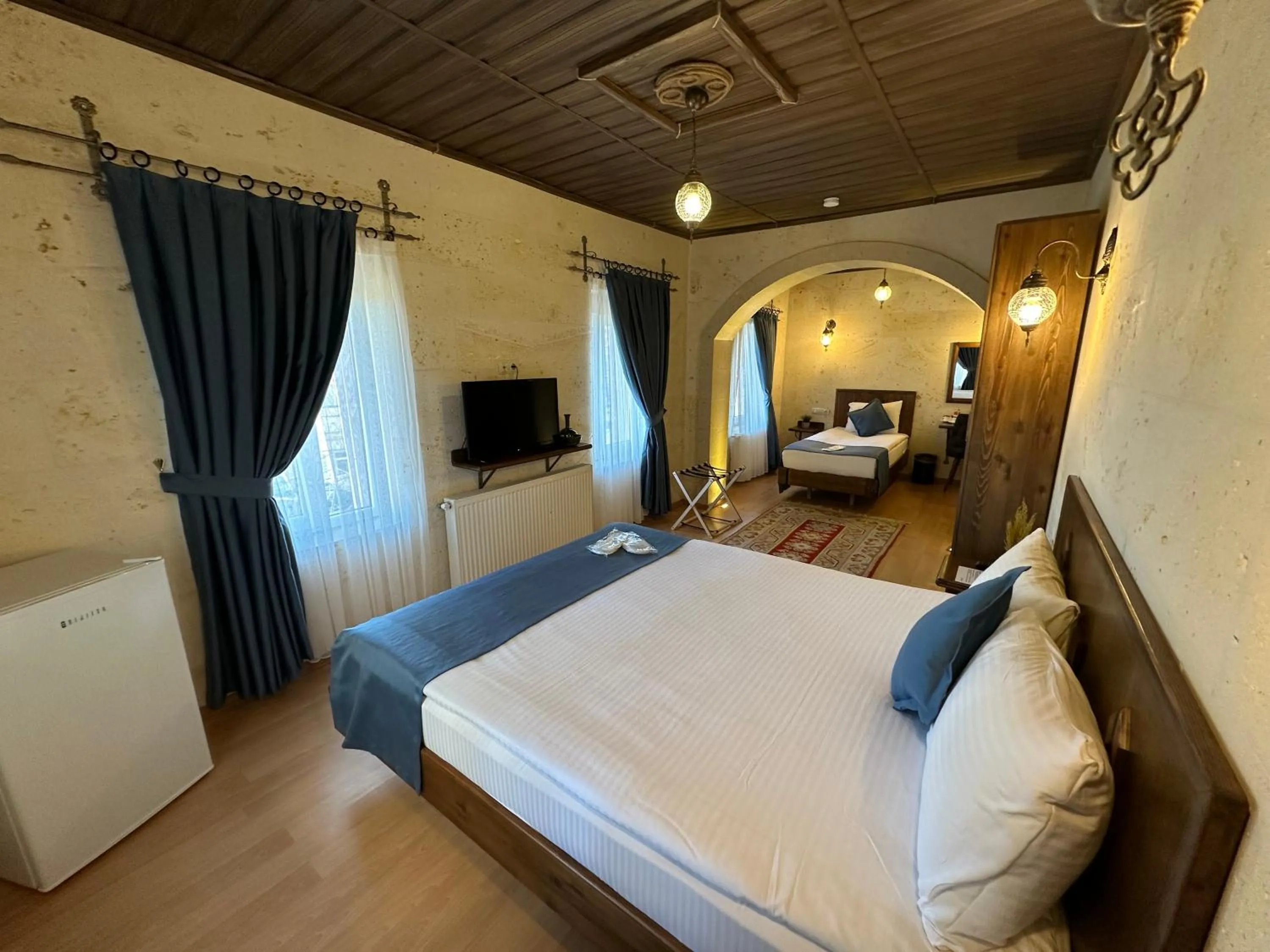 Bed in Virtus Cappadocia Hotel Göreme