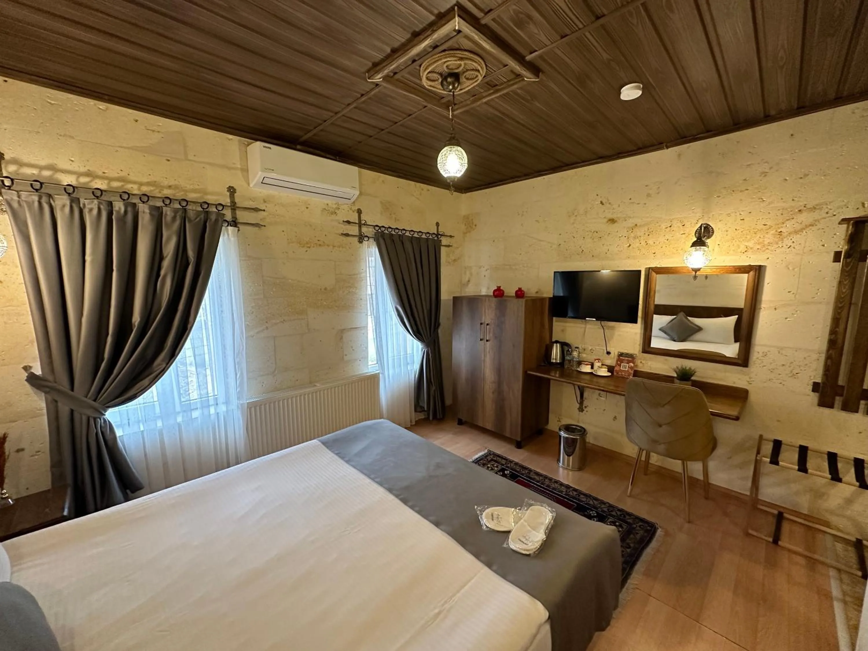 Bed in Virtus Cappadocia Hotel Göreme